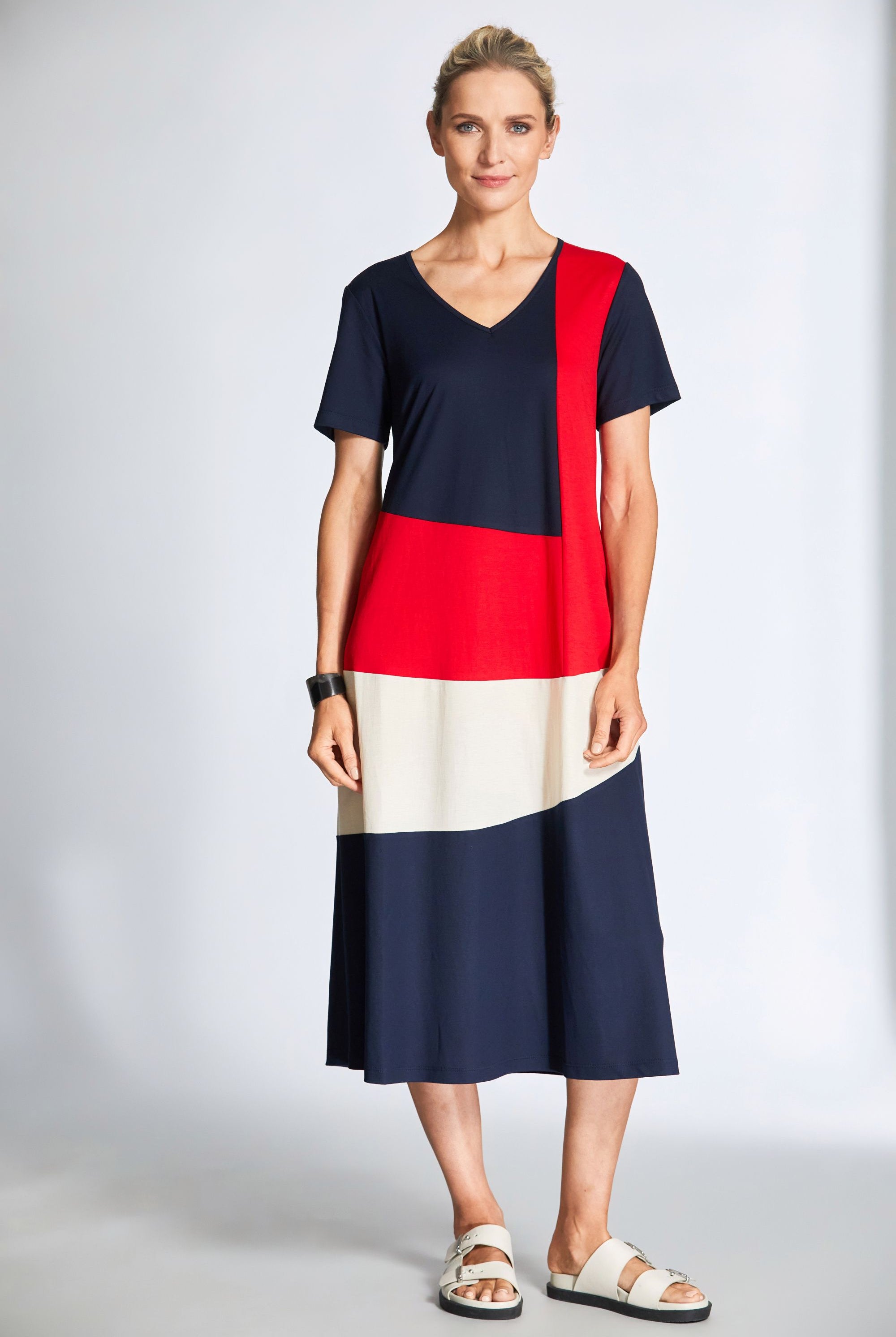 midi dress with navy red and cream colourblocking worn by model