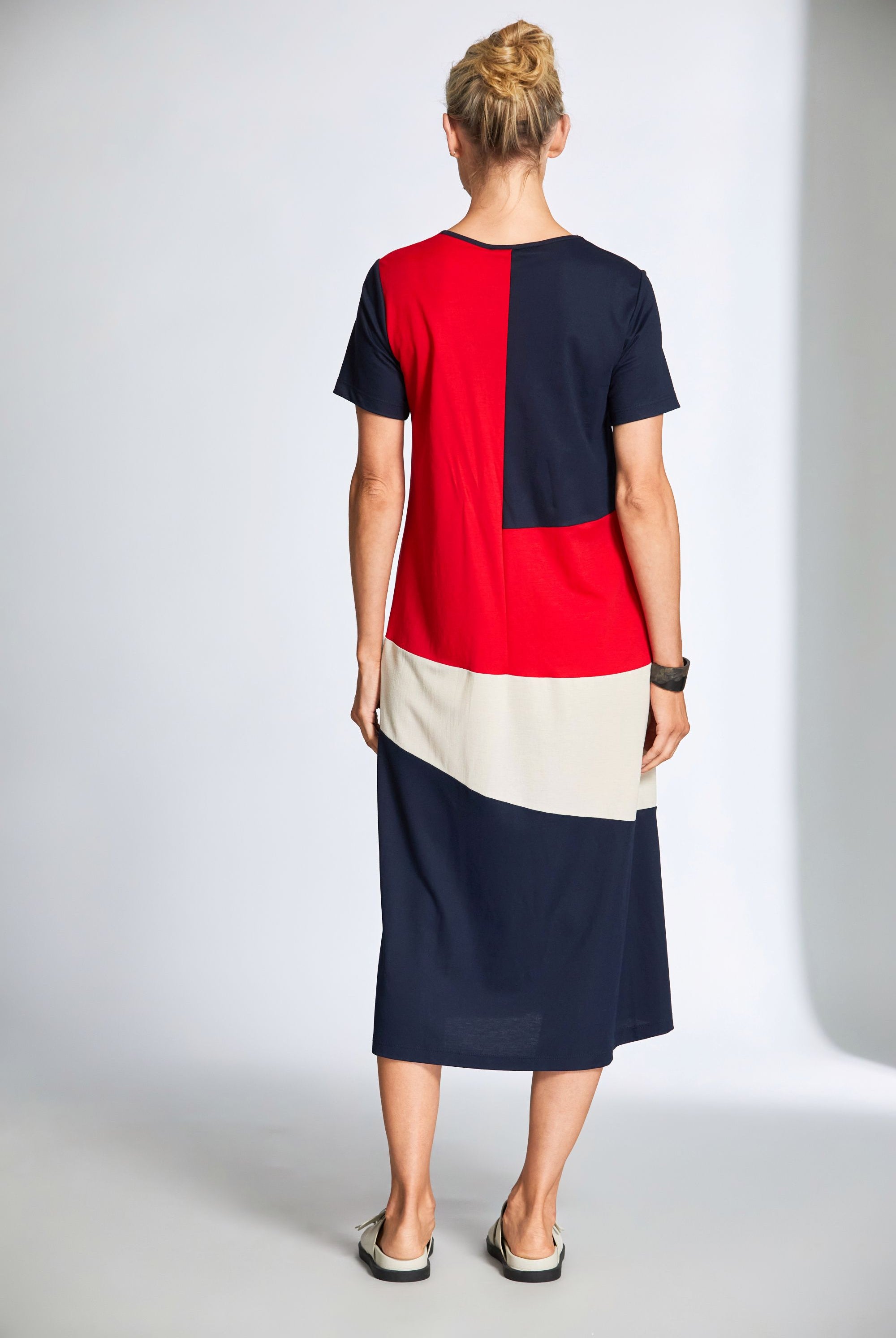 midi dress with navy red and cream colourblocking worn by model back view