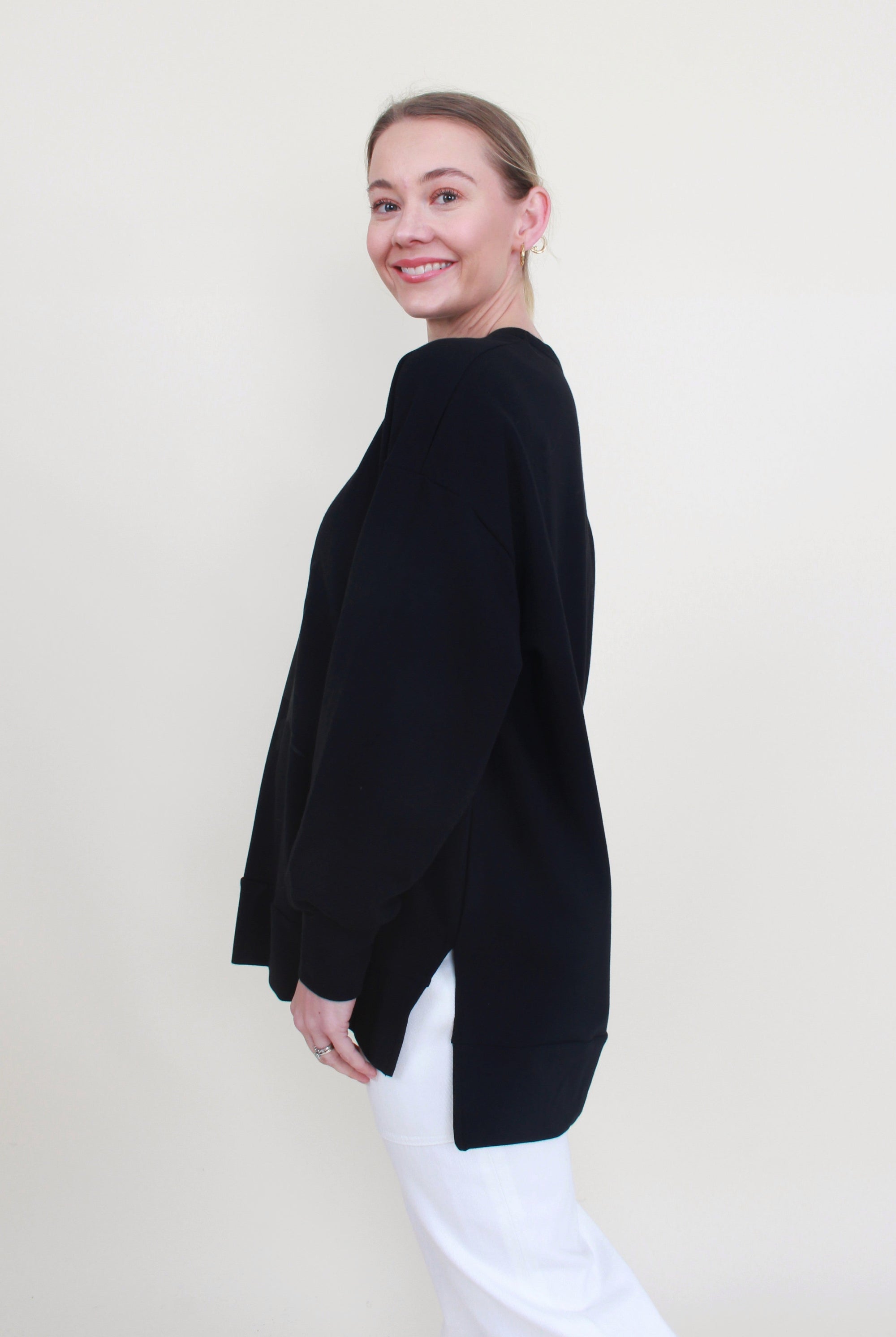 womens casual sweater with raven print black side view