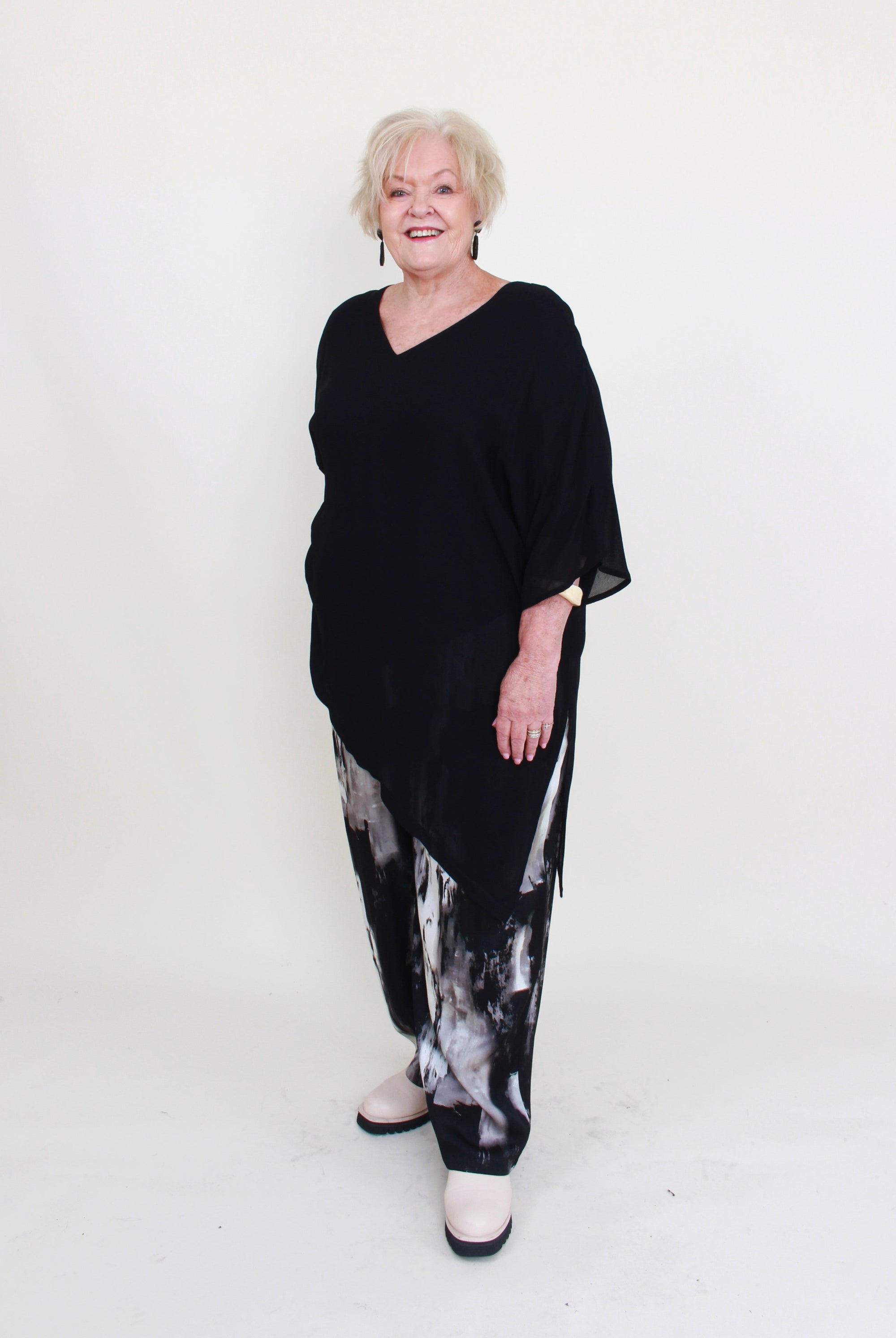 womens black semi sheer asymmetric reversible top black