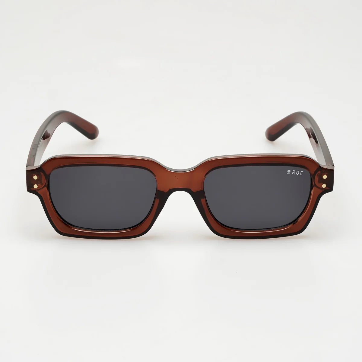 Sunglasses with brown frame and dark lenses on a white background