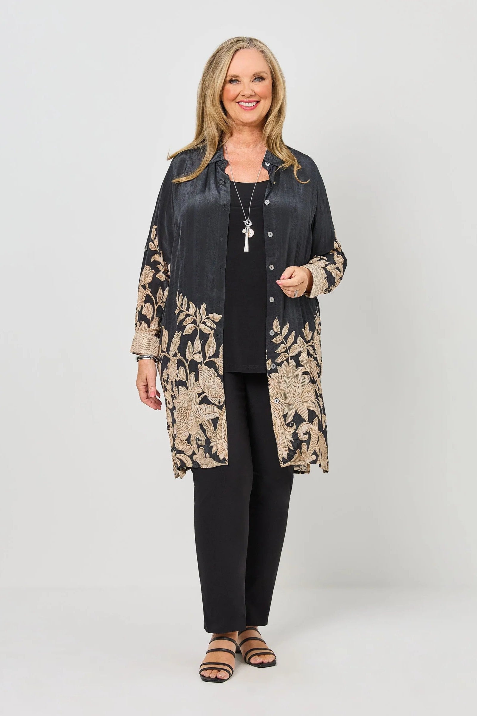 womens longline black with taupe floral shirt worn by model