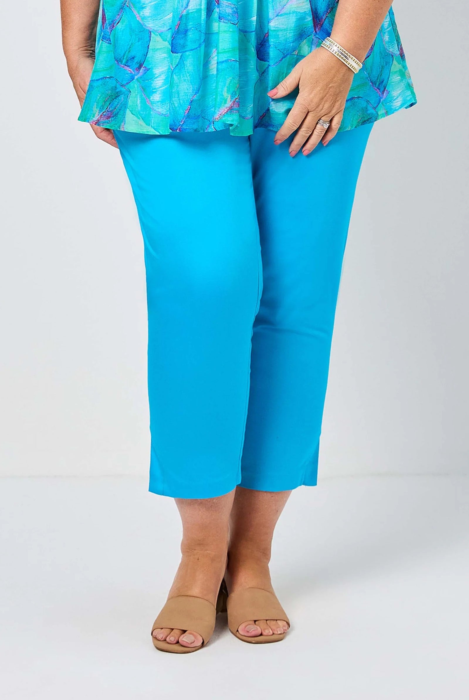 womens turquoise crop slim pants worn by model