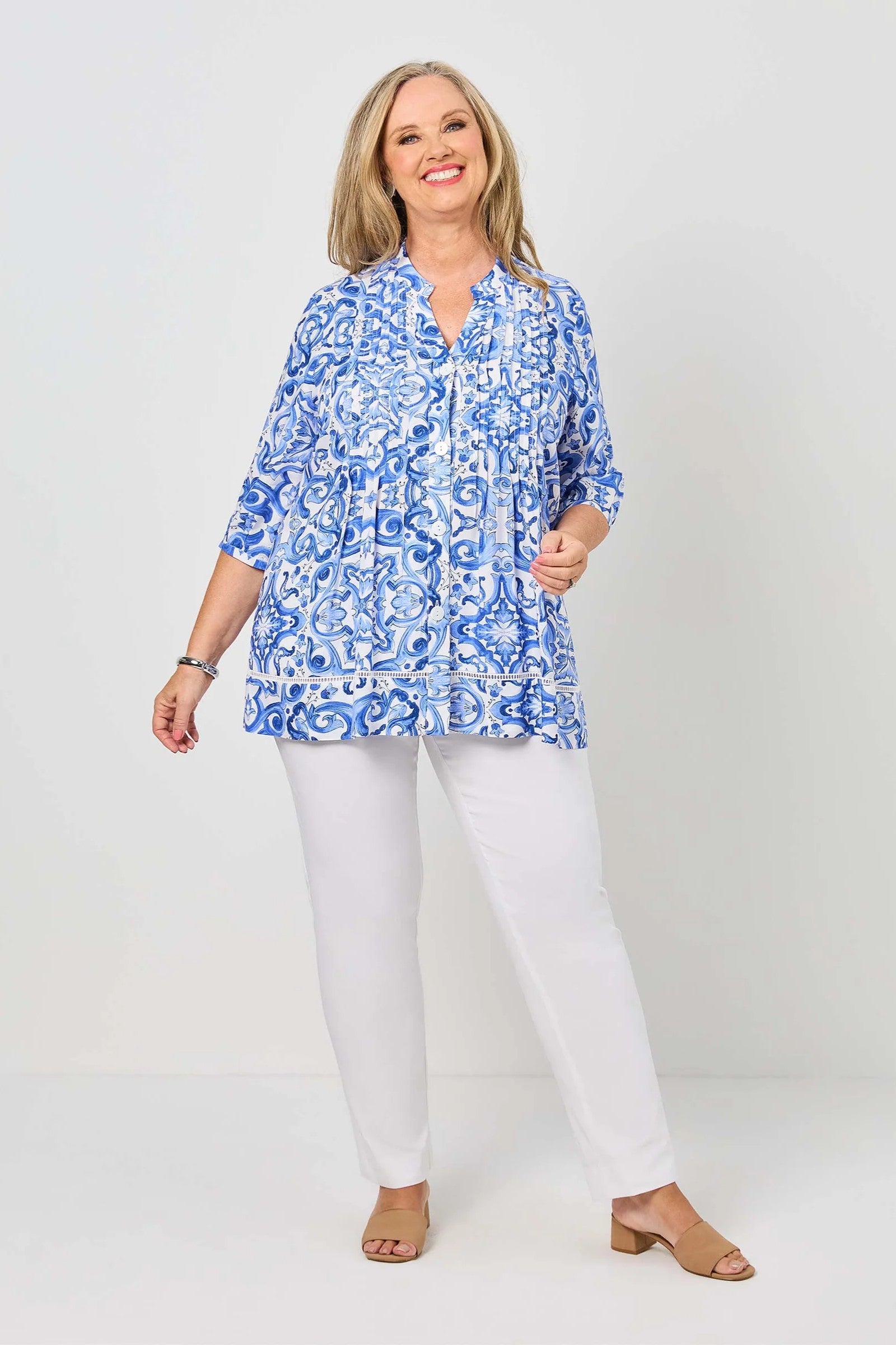 womens shirt blouse with blue white mediterranean print worn by model