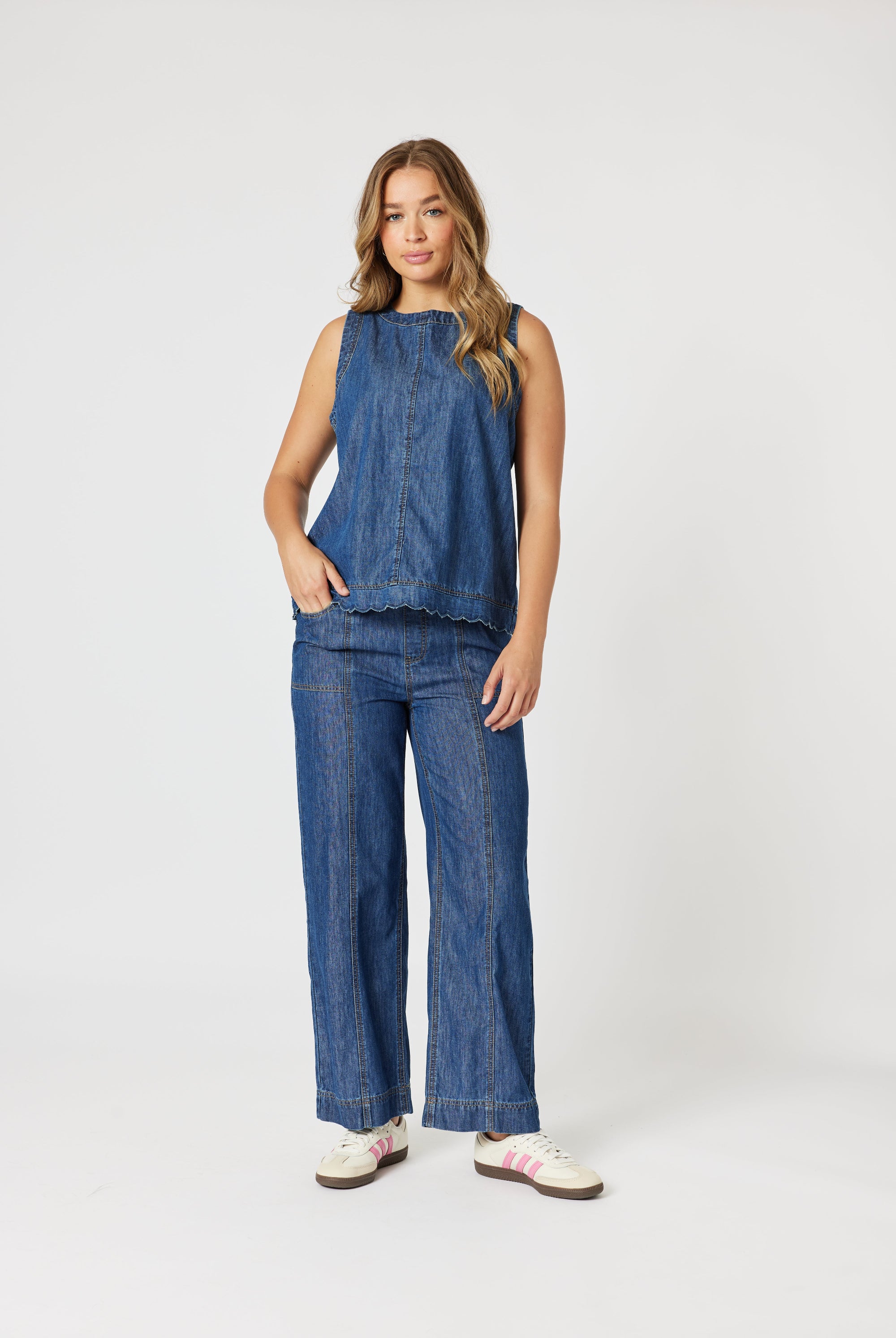 womens straight wide leg jean with top stitching mid wash worn by model