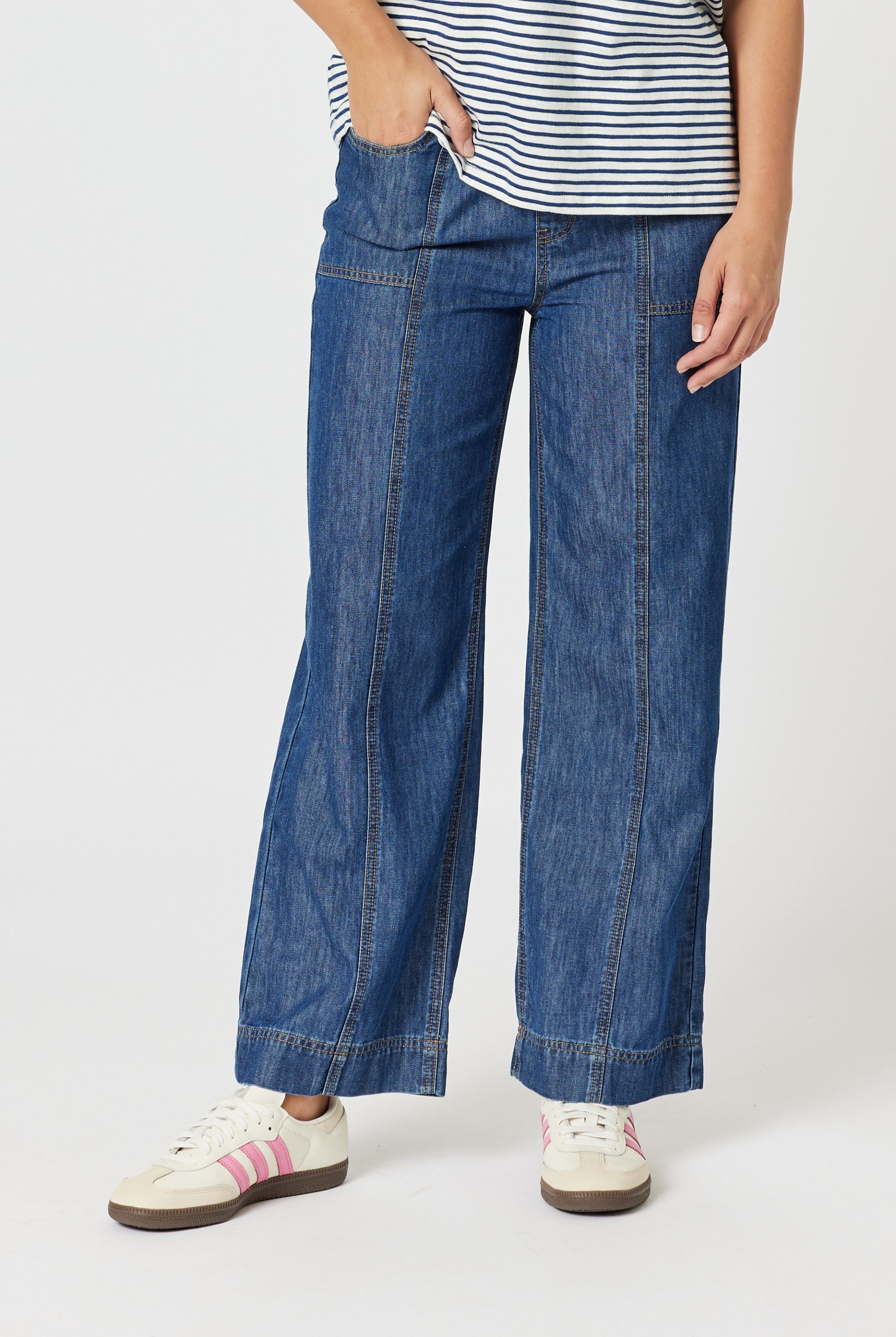 womens straight wide leg jean with top stitching mid wash worn by model