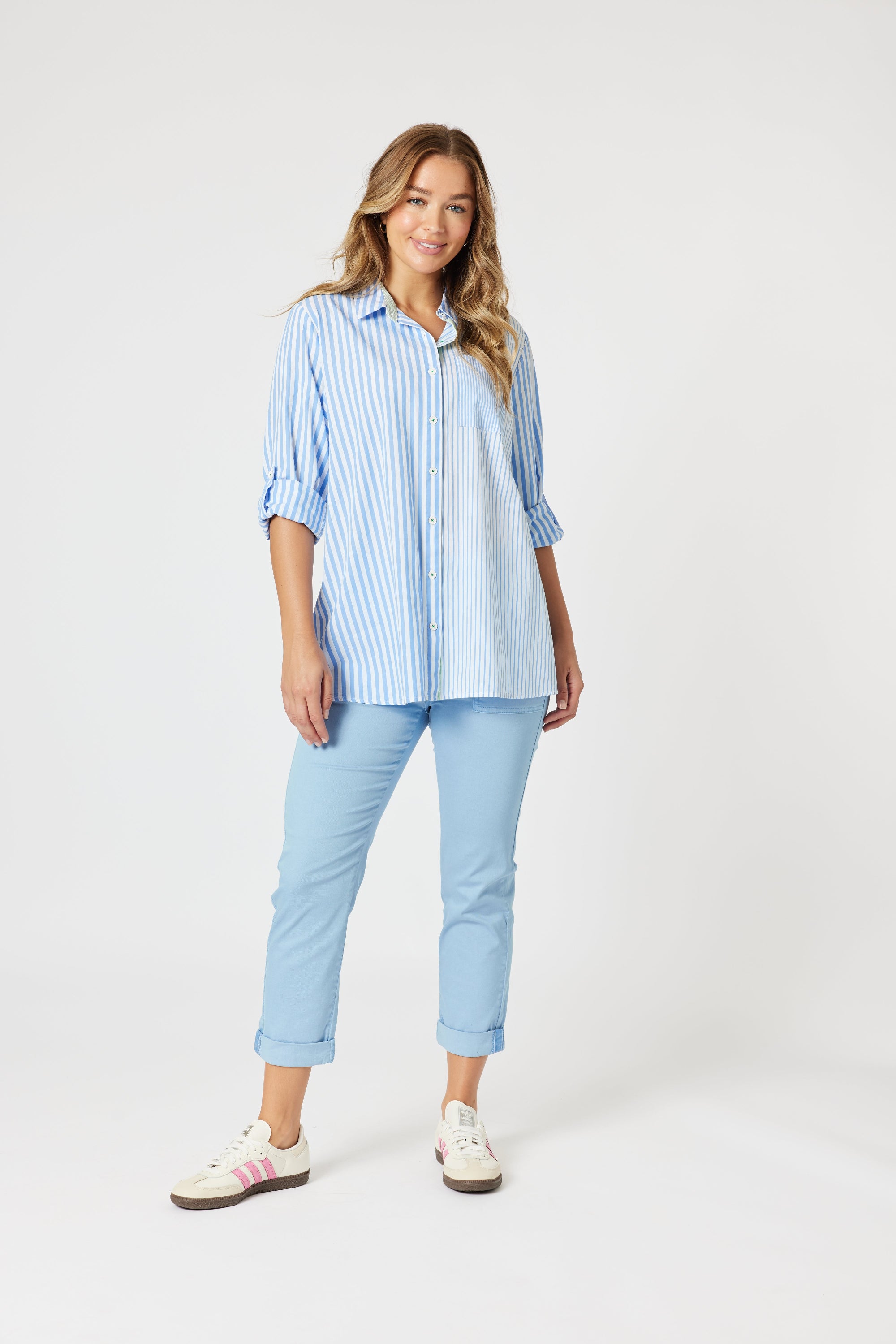 stripe button through shirt light blue and white with long adjustable sleeve worn by model