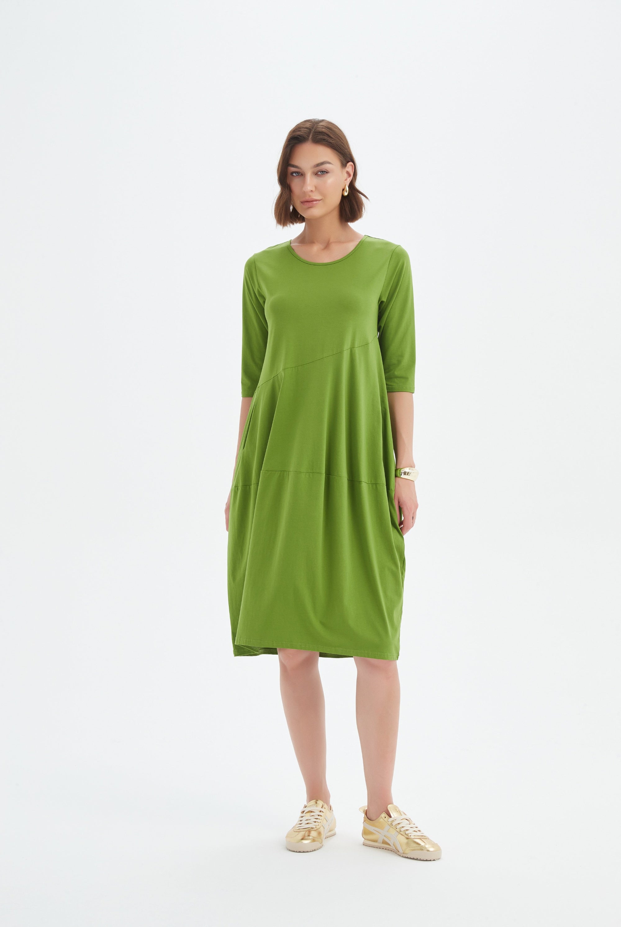 midi diagonal seam dress in green worn by model