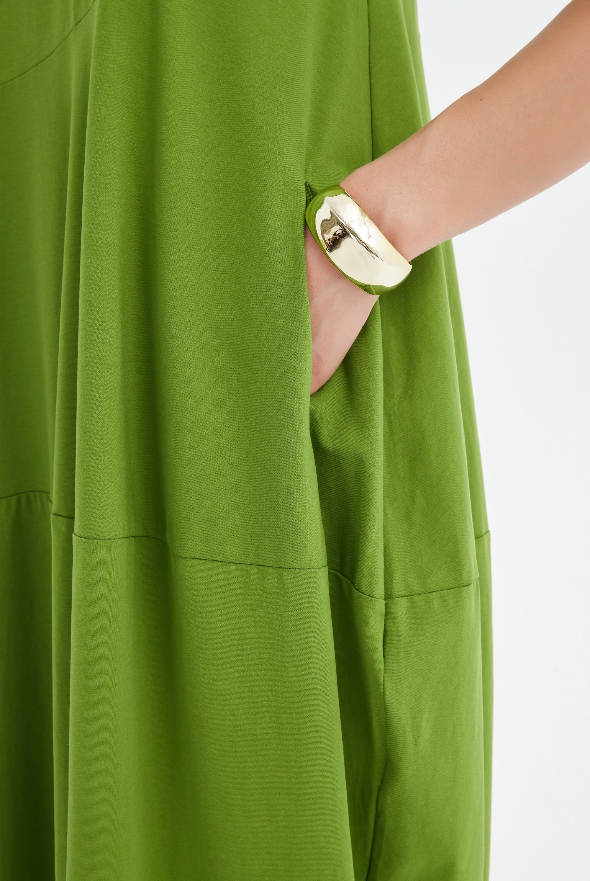 midi diagonal seam dress in green worn by model