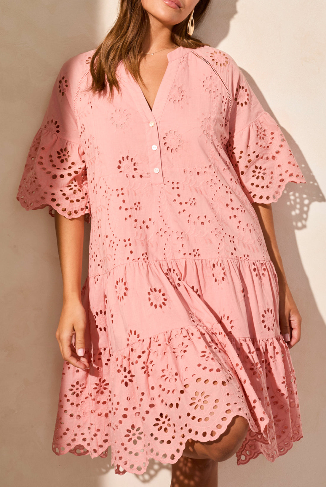 broderie anglaise midi dress in pink worn by model