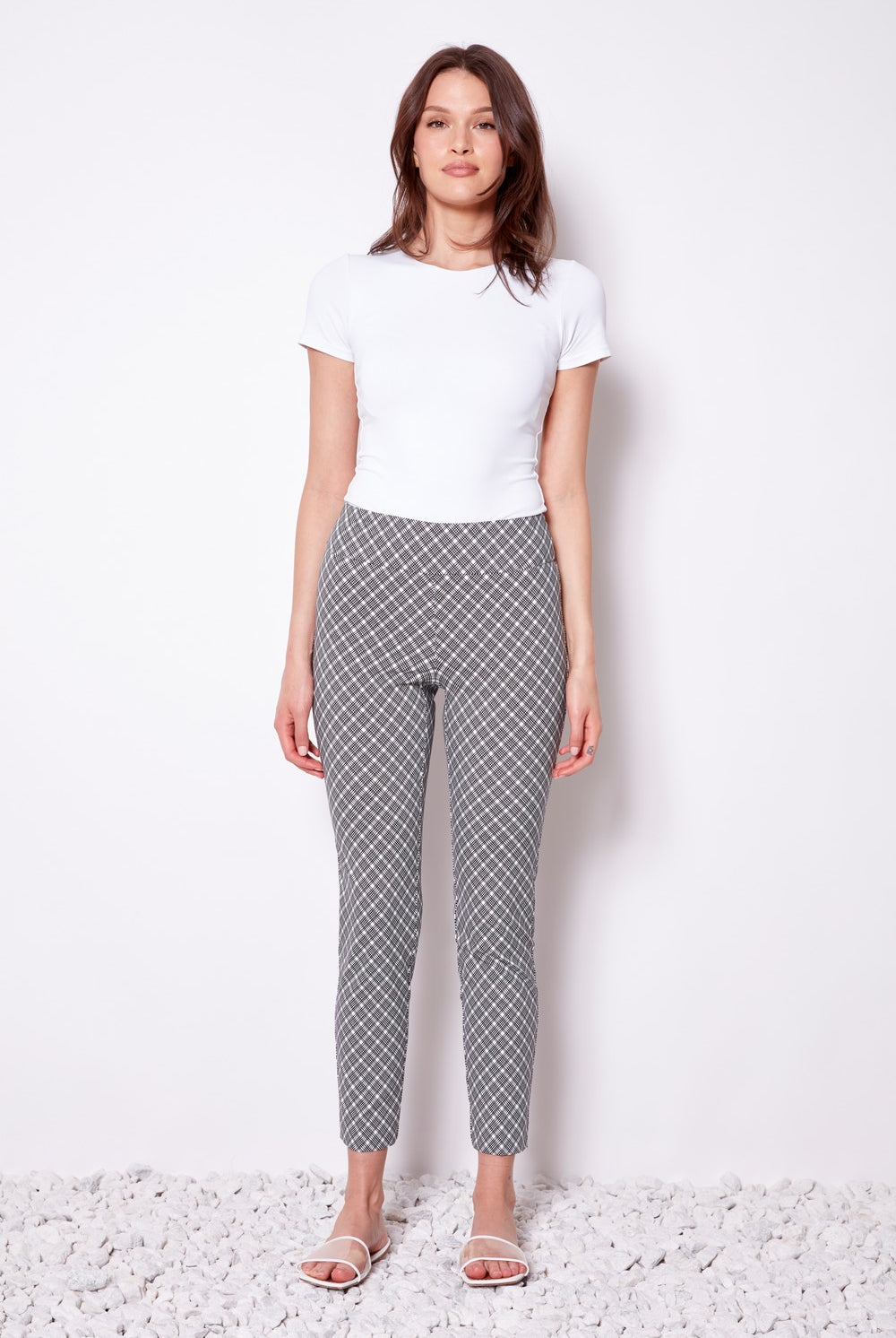 black and white geometric slim pant with white tee worn by model