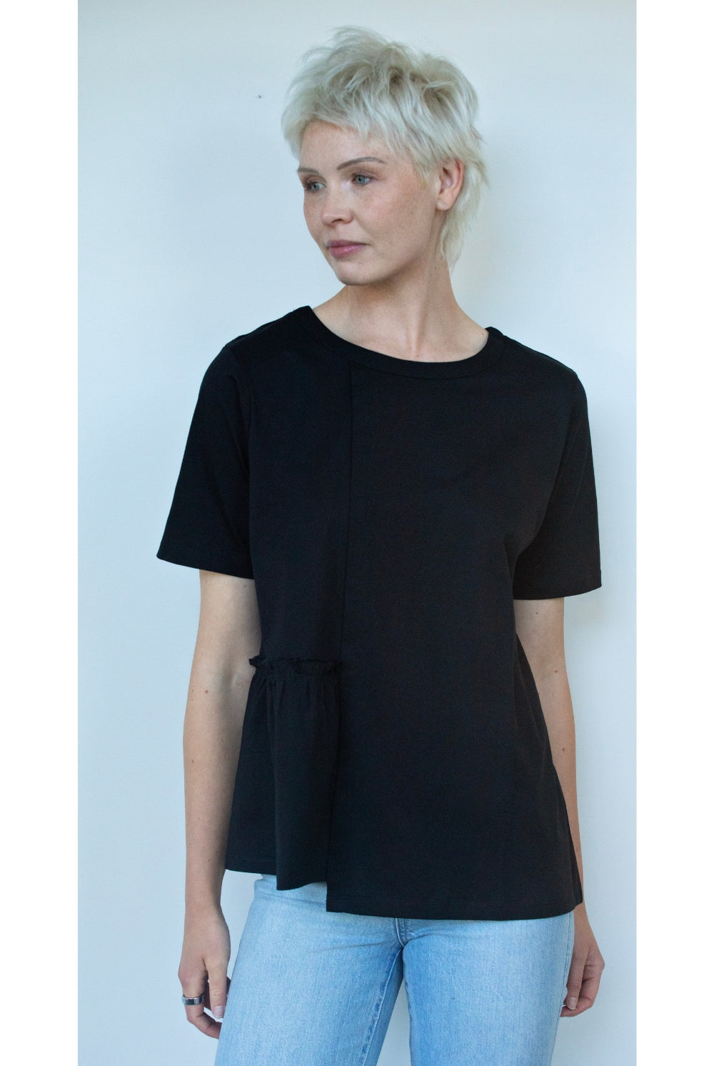 womens tee with gather detailing in black worn by model