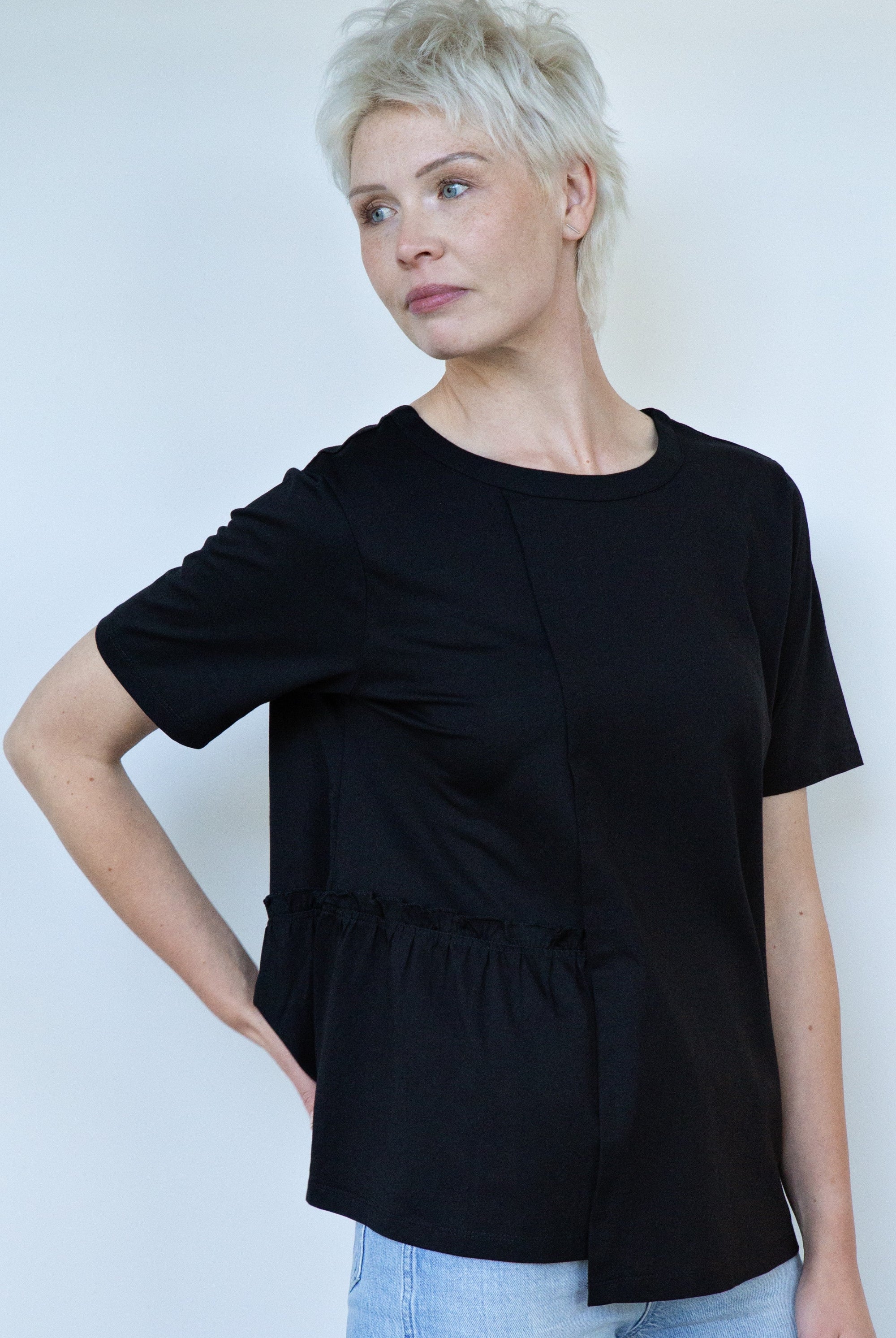 womens tee with gather detailing in black worn by model
