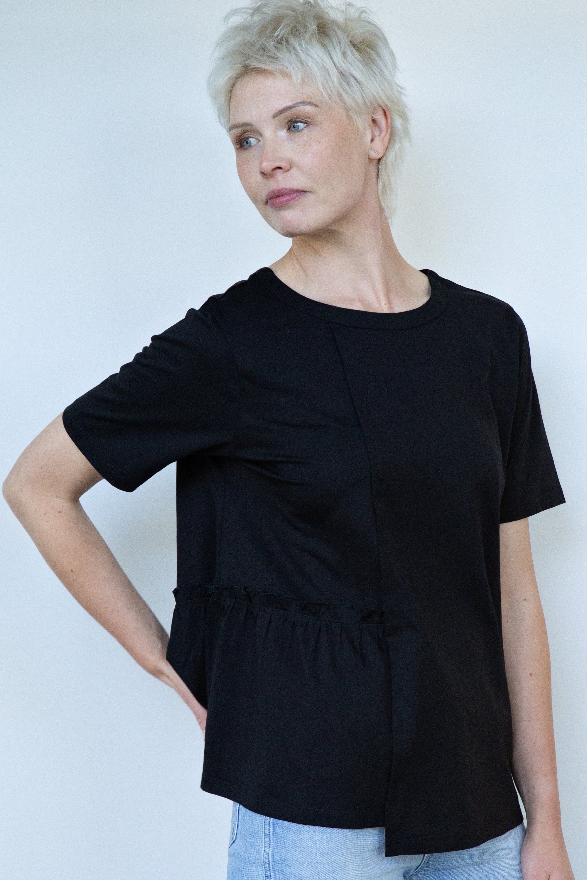 womens tee with gather detailing in black worn by model