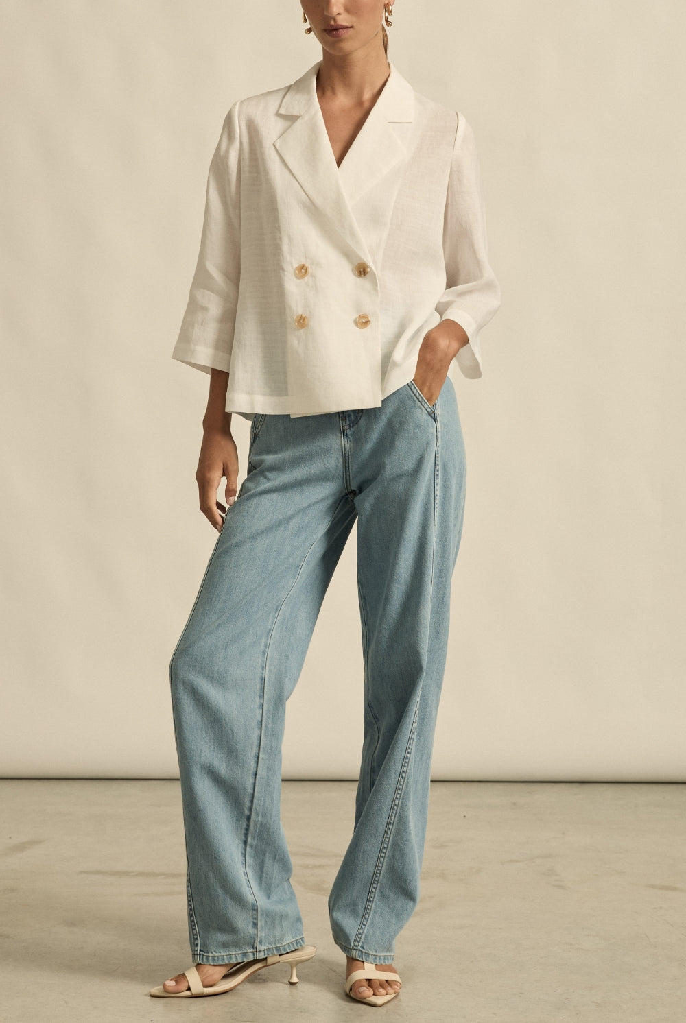 womens double breasted jacket in porcelain and jeans worn by model