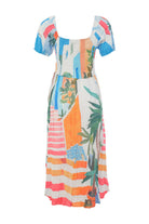 Colorful dress with tropical pattern on a white background