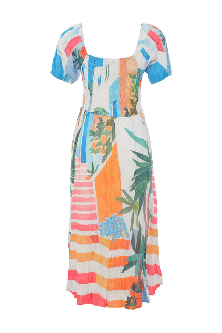Colorful dress with tropical pattern on a white background