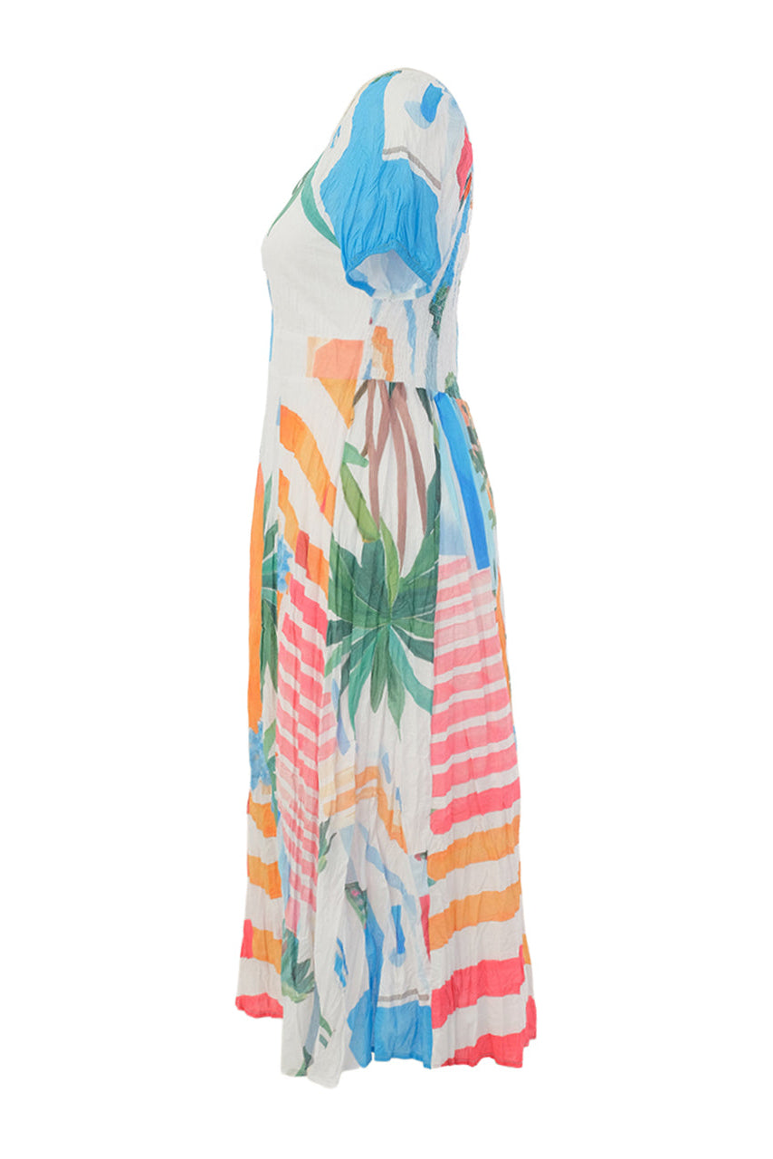 Colorful dress with tropical print on a white background