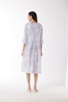 light grey print midi dress worn by model back view