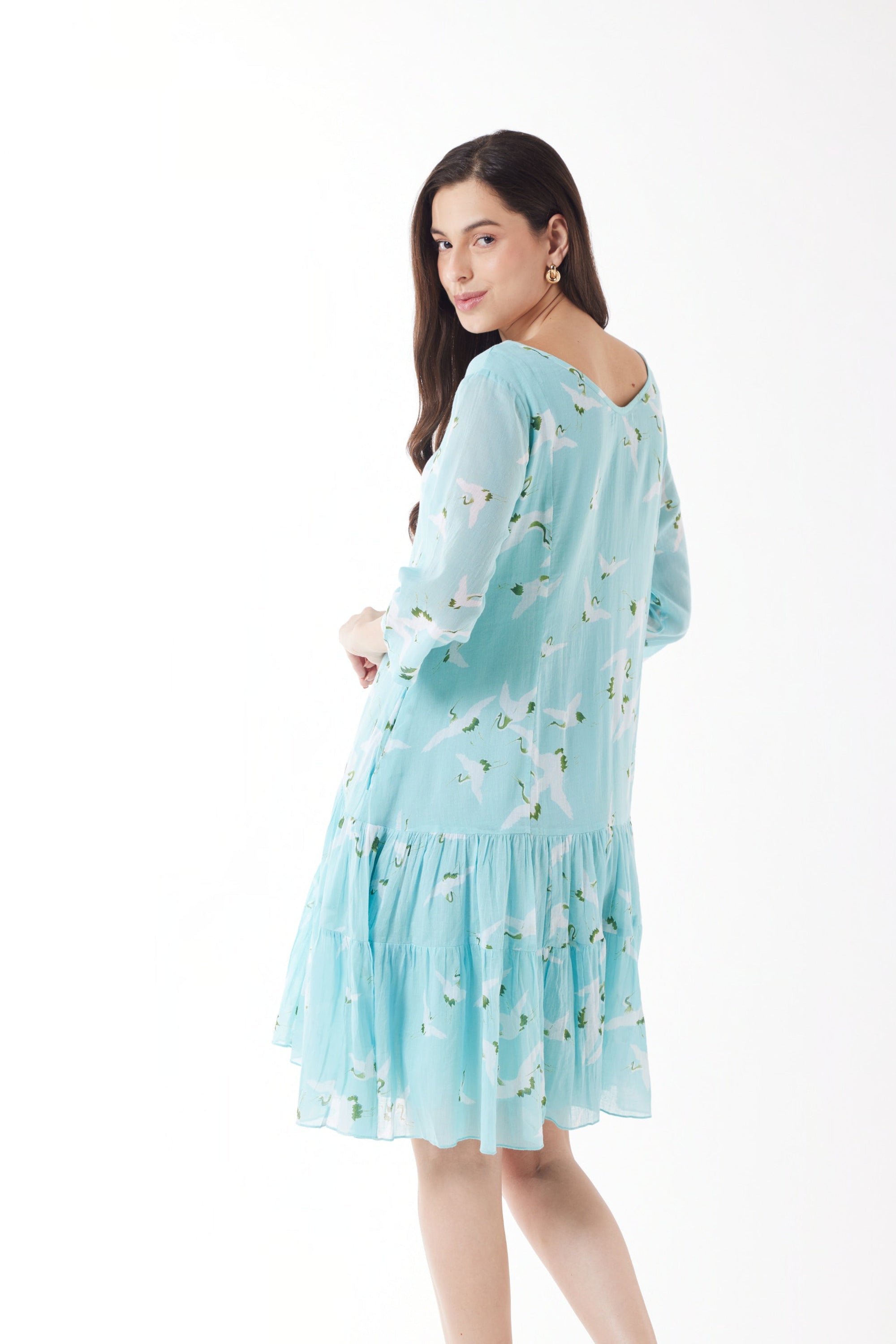 blue with white bird print midi dress worn by model back view