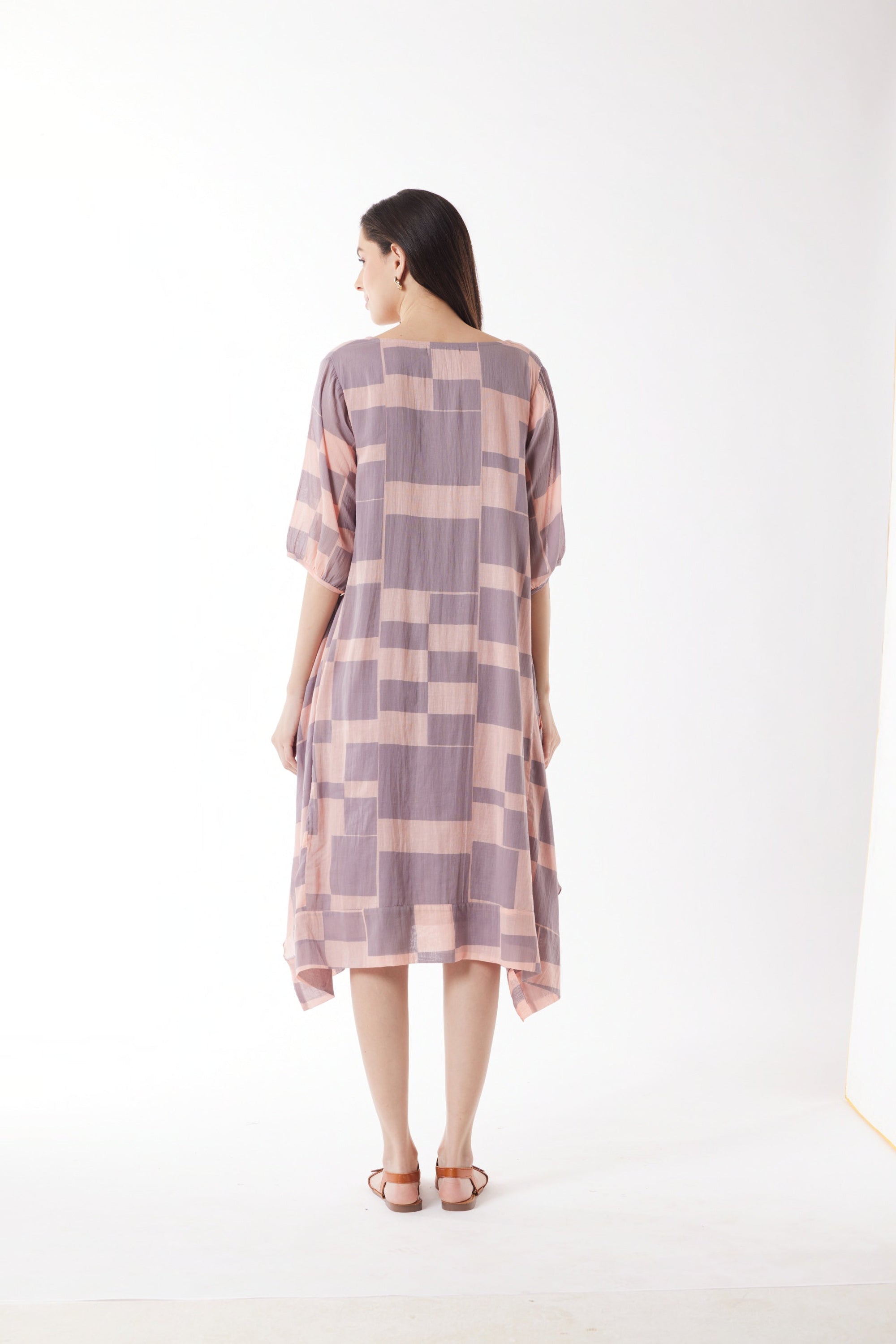dusty pink purple block print midi dress worn by model back view