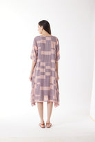 dusty pink purple block print midi dress worn by model back view