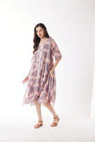 dusty pink purple block print midi dress worn by model 