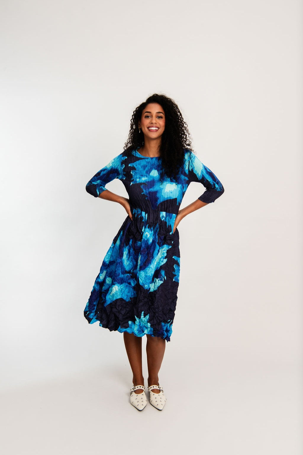 womens smash pleat midi dress blue black floral worn by model