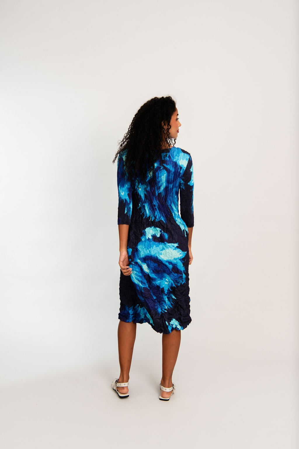 womens smash pleat midi dress blue black floral worn by model back view