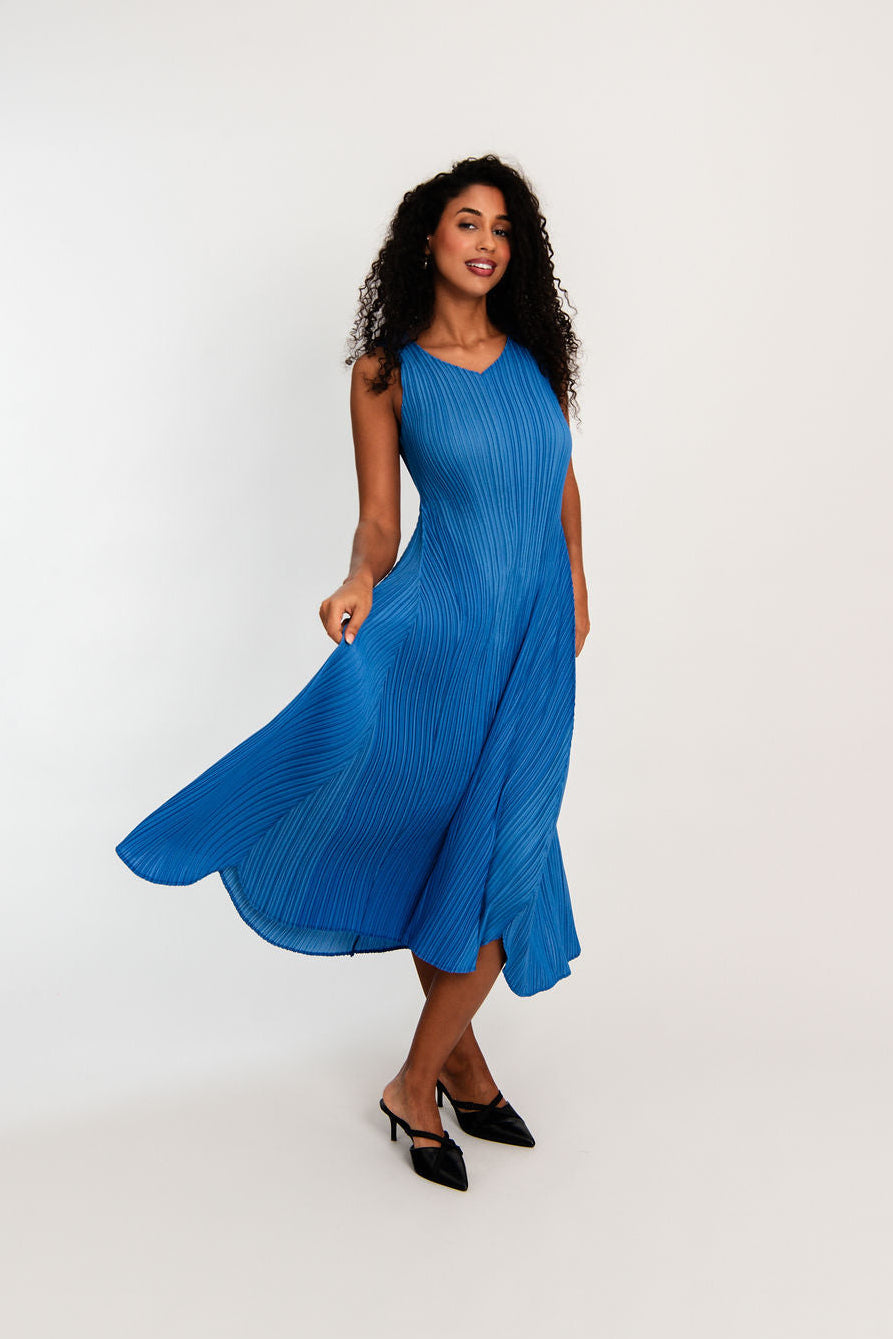 midi maxi pleated dress in royal blue worn by model
