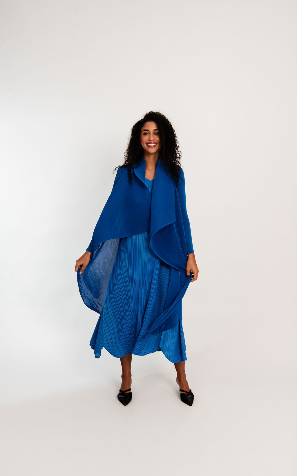midi maxi pleated dress and coat in royal blue worn by model