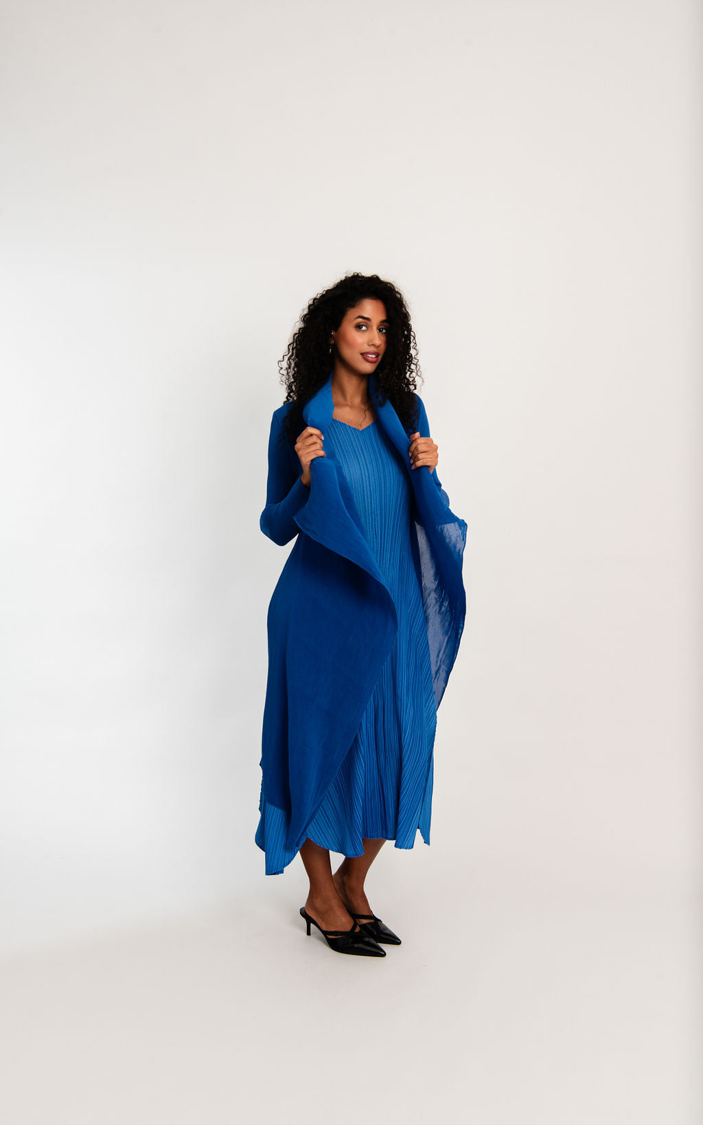 midi maxi pleated dress and coat in royal blue worn by model