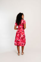 womens smash finish midi dress pink floral worn by model back view