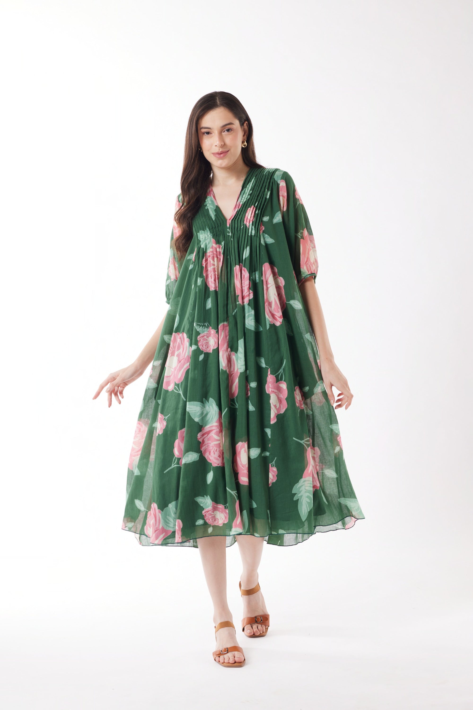 pleated midi dress emerald with roses worn by model 
