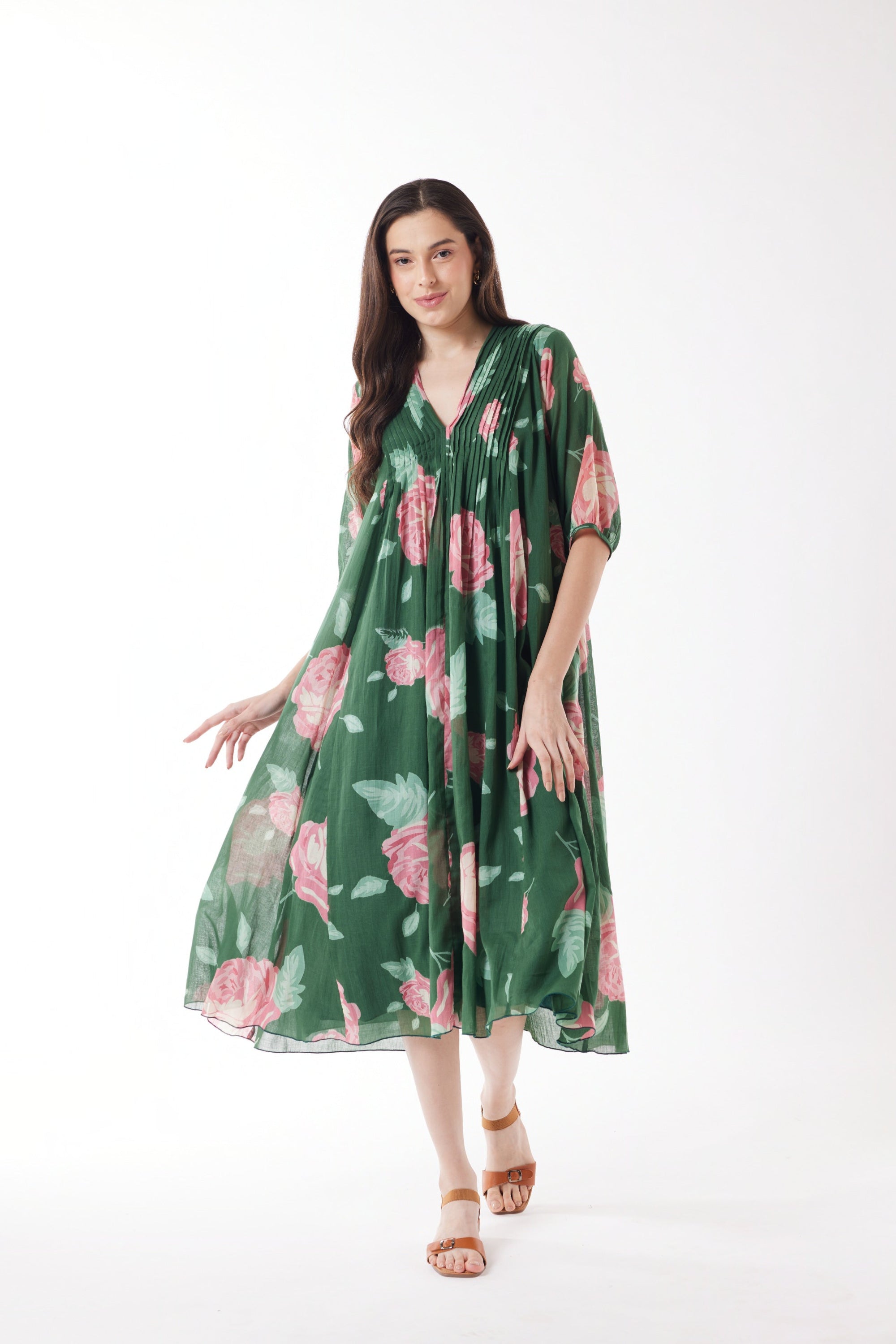pleated midi dress emerald with roses worn by model 