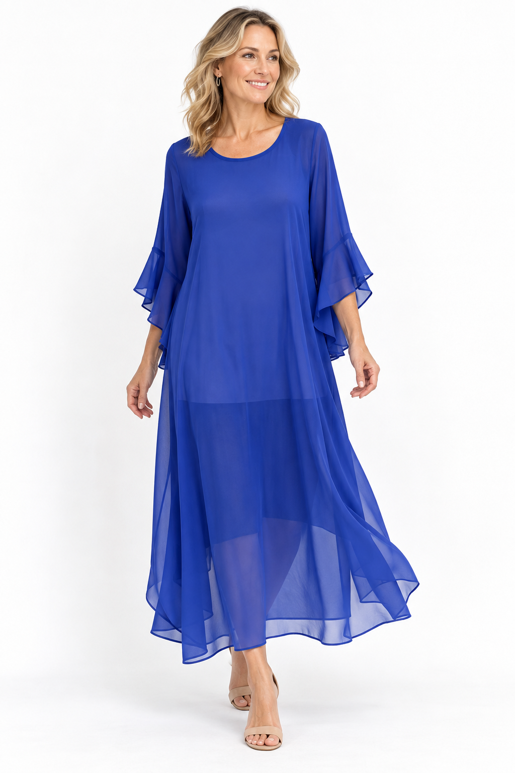Woman wearing a floaty blue chiffon dress against a white background.