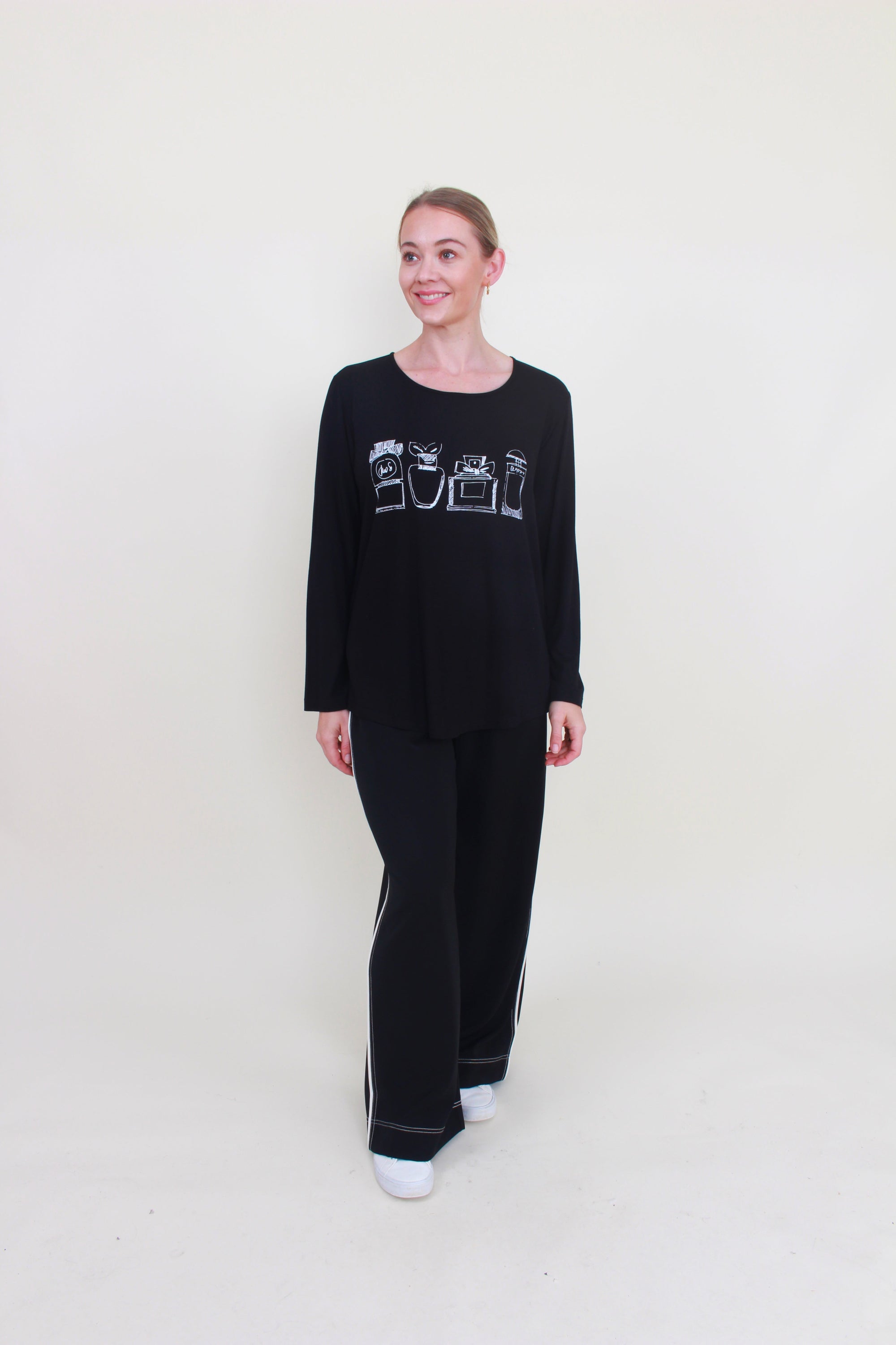 womens curve hem top black with purfume bottle print