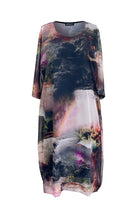 Multicolored dress with nature-themed print on a white background