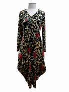 Leopard print dress with floral patterns on a mannequin against a white background