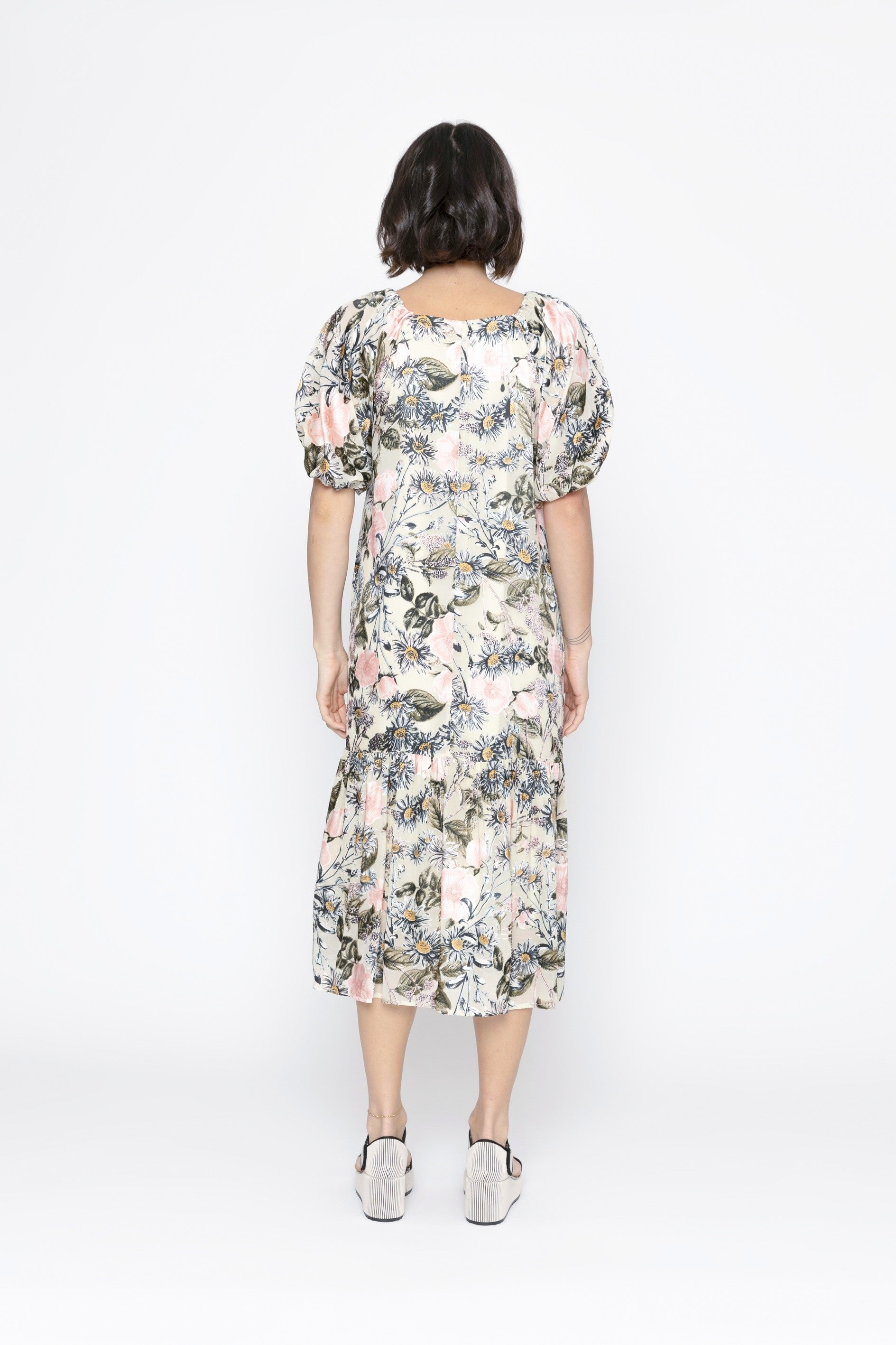 light floral midi dress puff sleeve worn by model back view