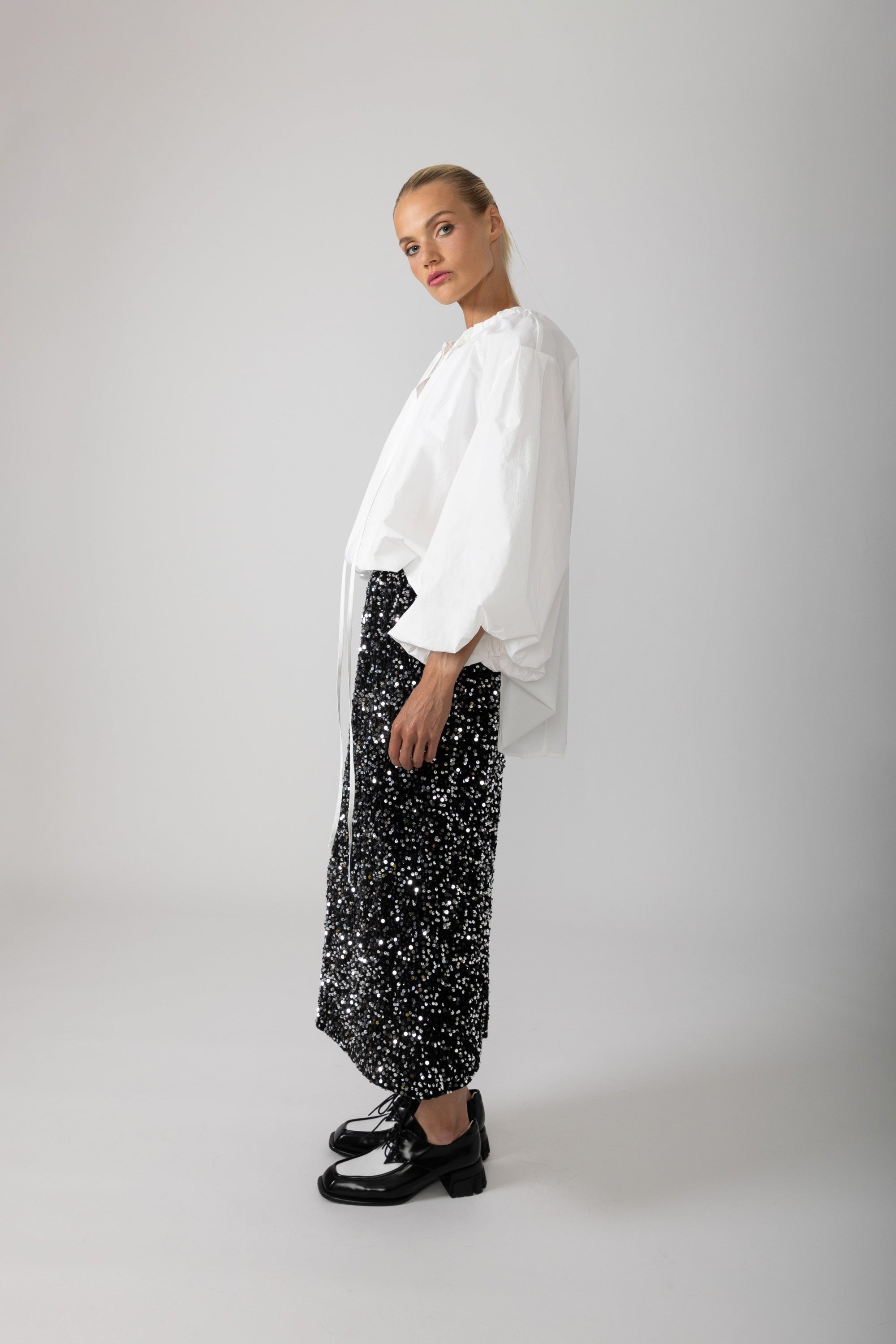 womens shirt with balloon sleeves and ruffles white side view