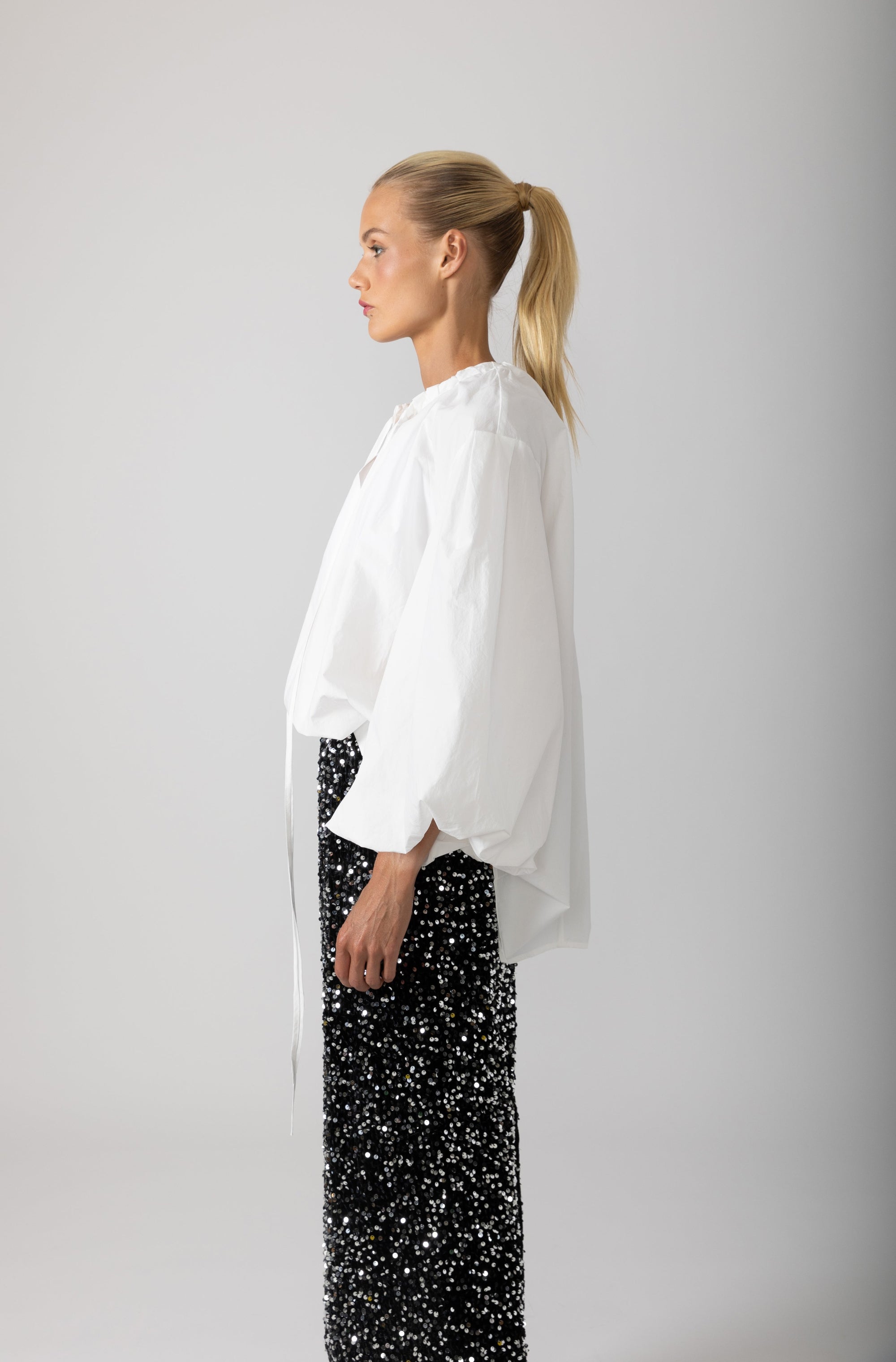 womens shirt with balloon sleeves and ruffles white side view