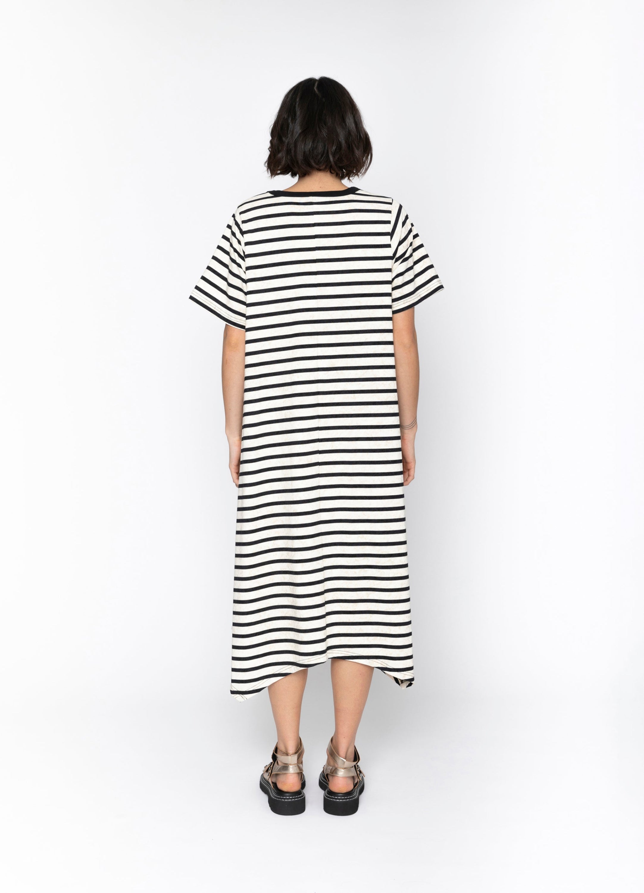 black and white stripe midi dress worn by model 