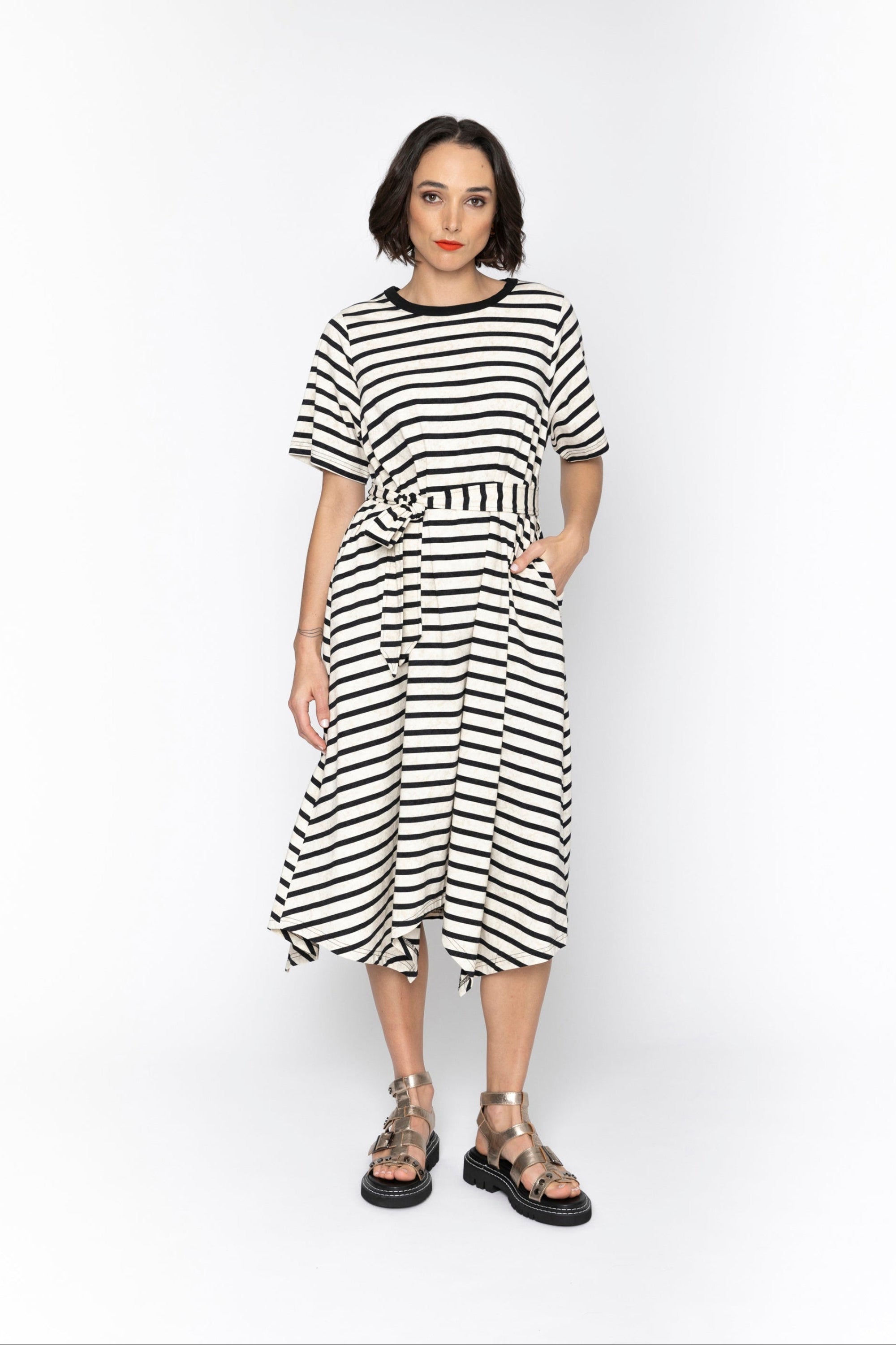 black and white stripe midi dress worn by model 