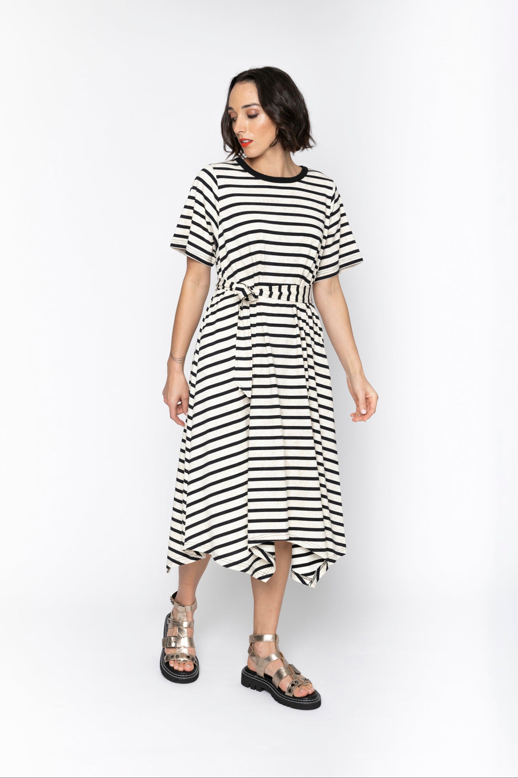 black and white stripe midi dress worn by model 