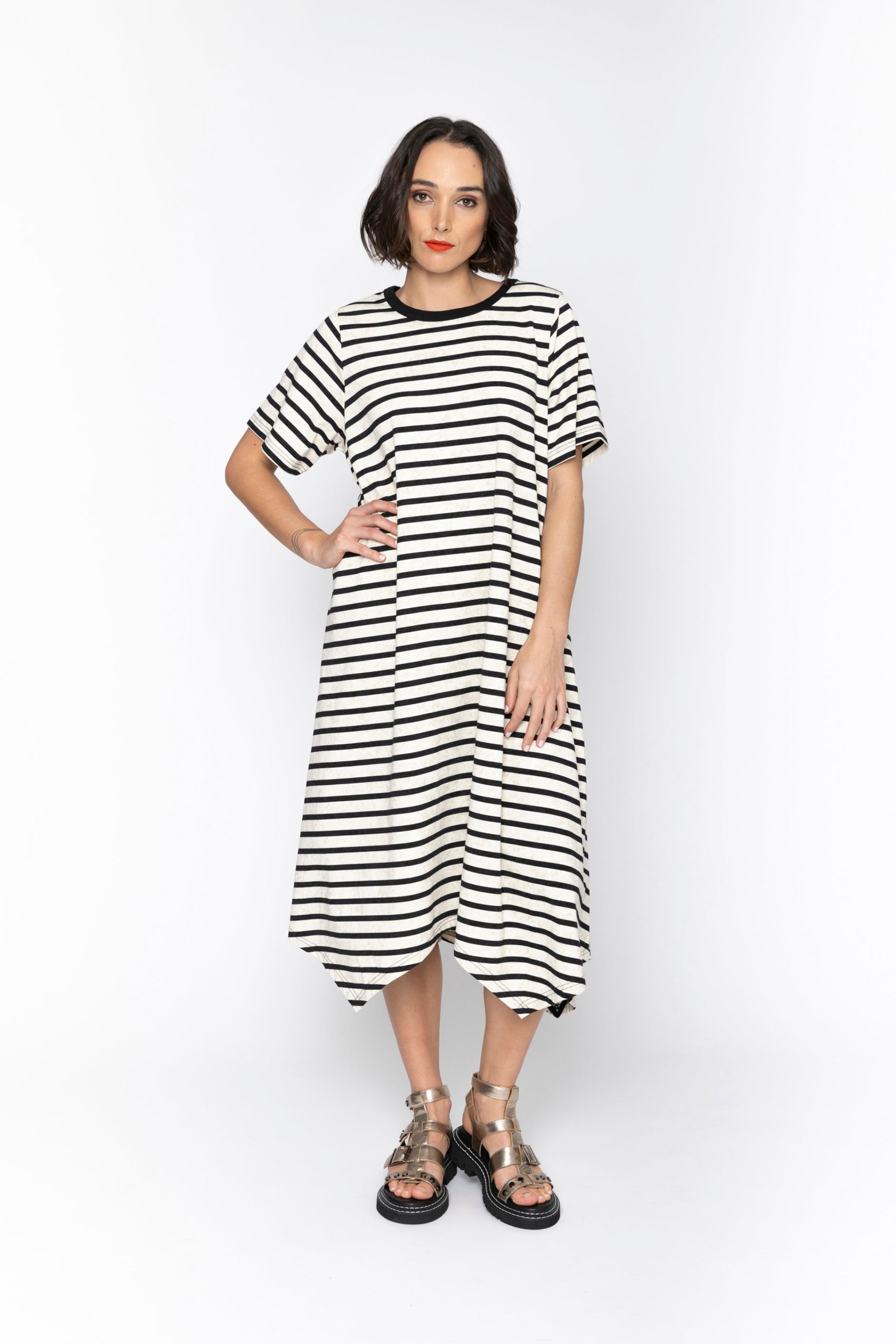 black and white stripe midi dress worn by model 