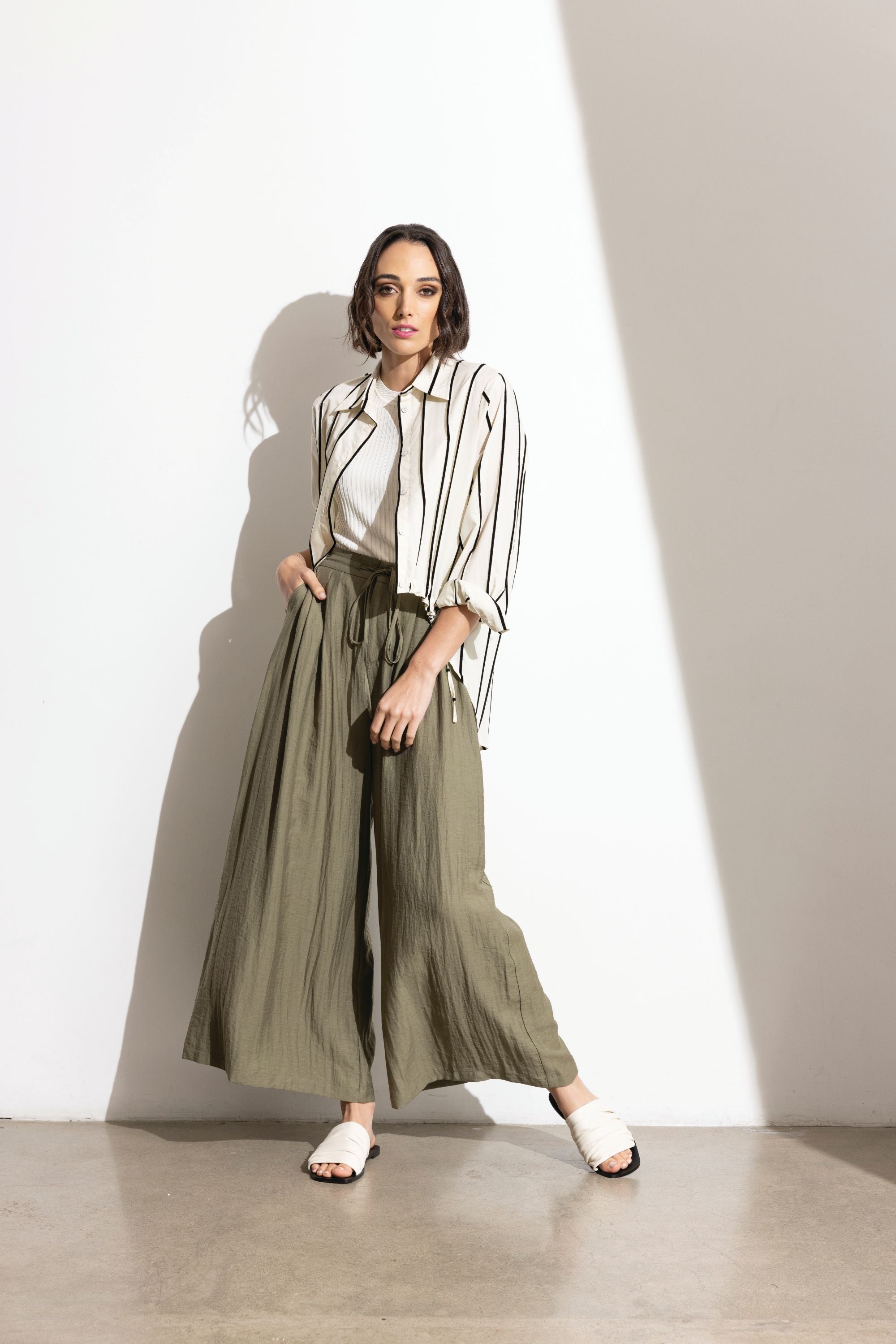 womens drawstring high low hem shirt off white black stripe worn by model