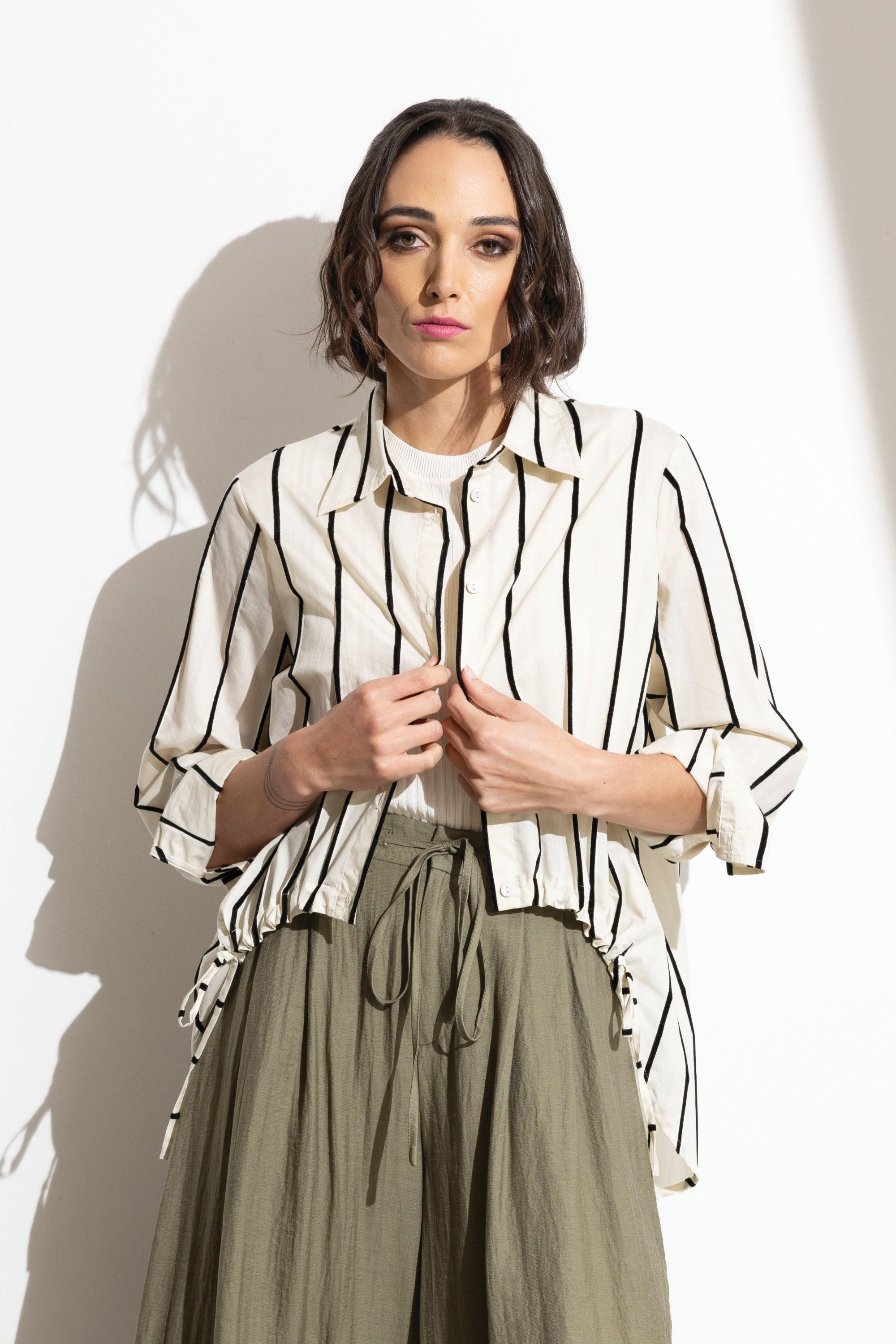 womens drawstring high low hem shirt off white black stripe worn by model