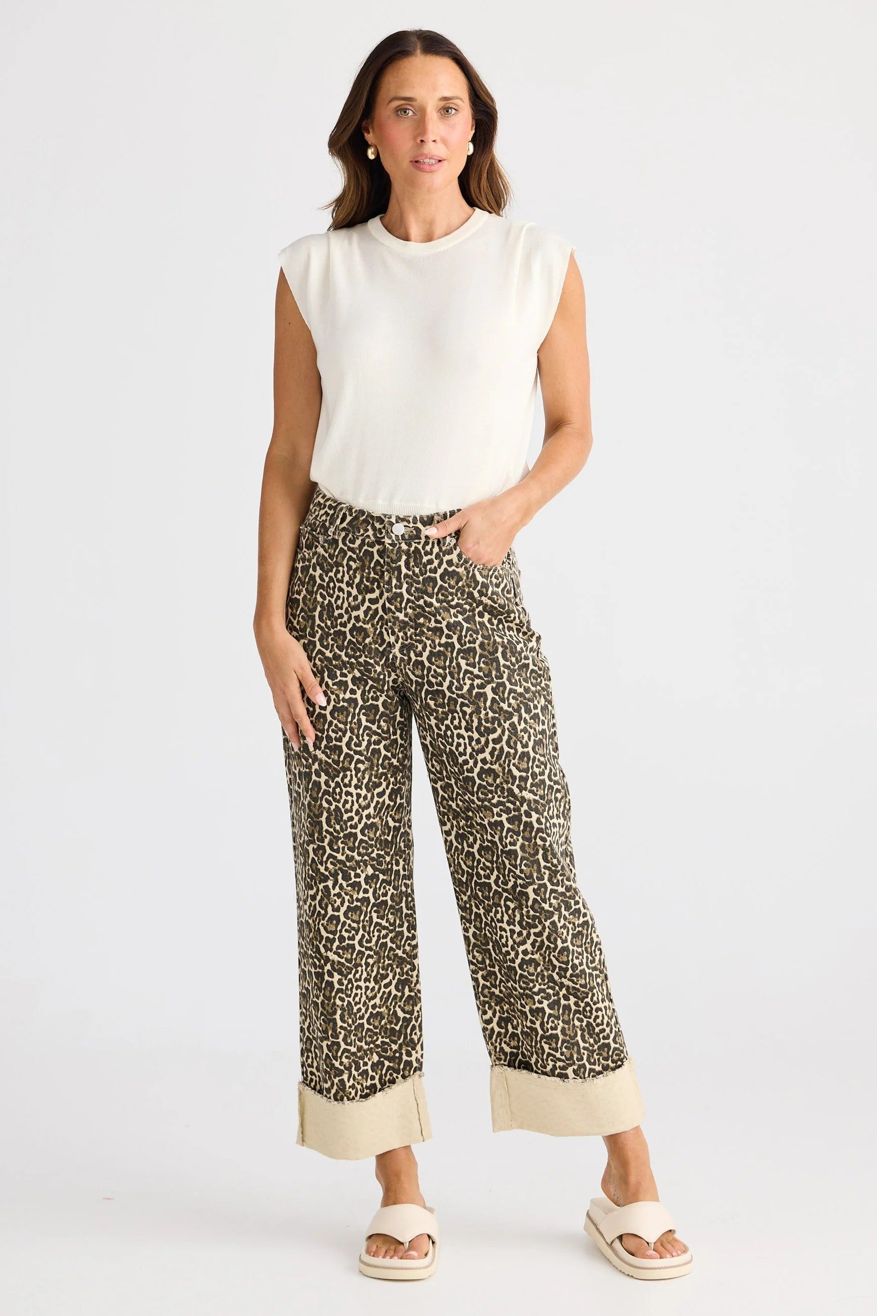 leopard print wide leg pant and white tee worn by model 