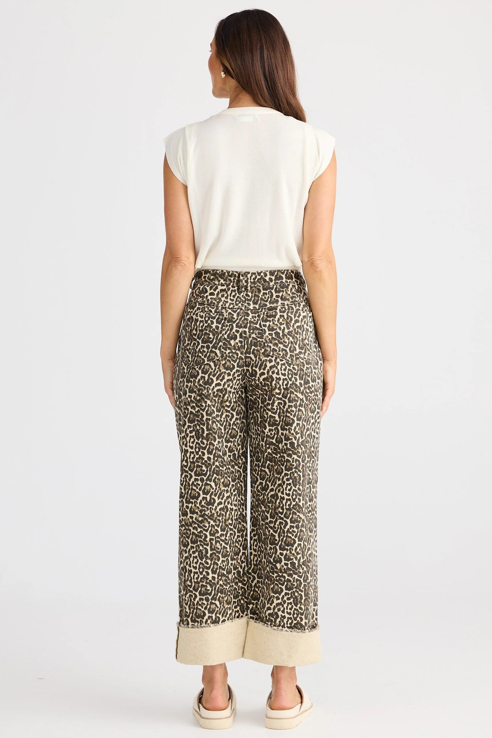 leopard print wide leg pant and white tee worn by model back view